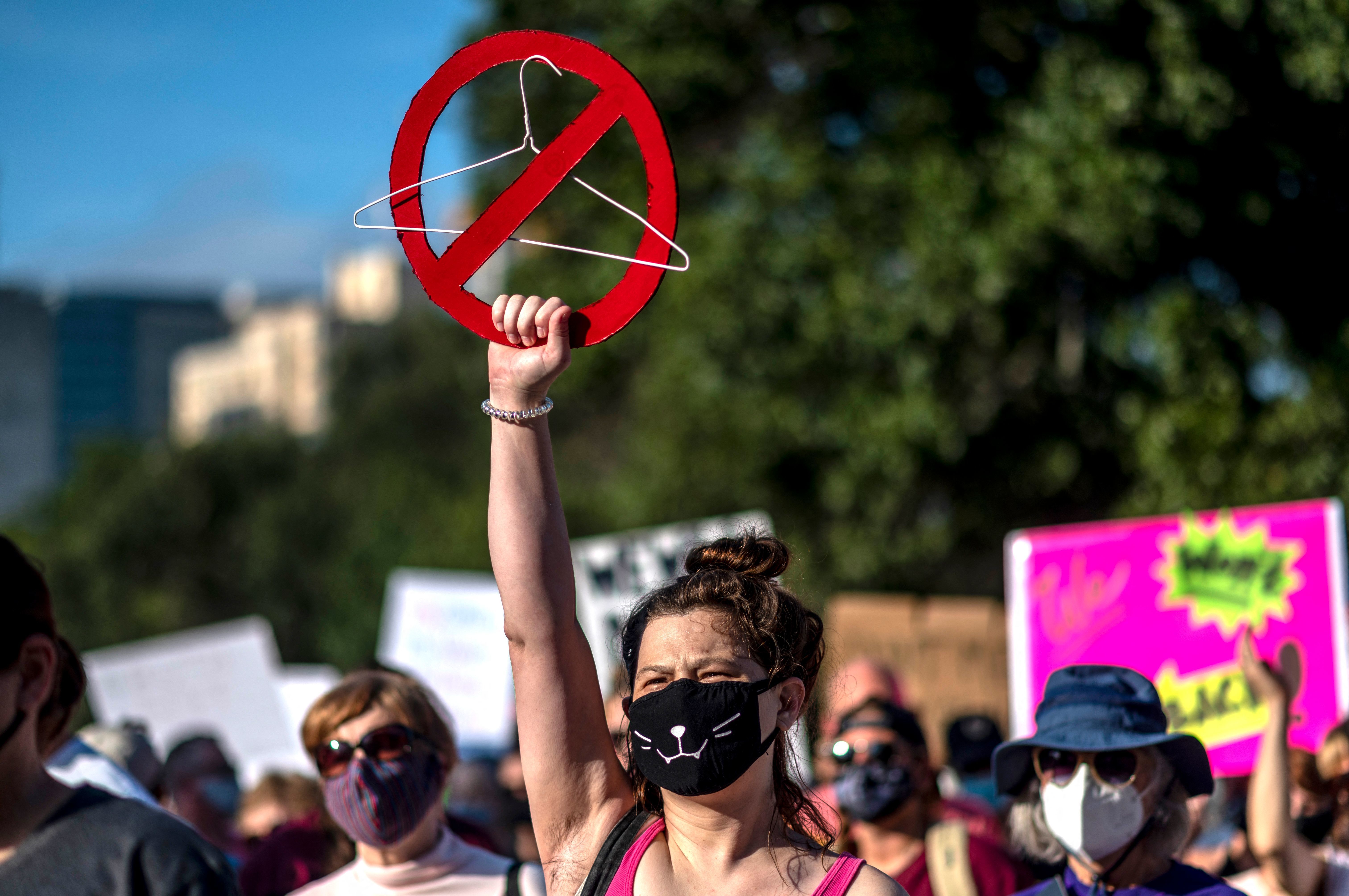Abortion-rights supporters protest in Austin, Texas, in October. Doctors say their worst fears about the Texas abortion law are coming true. (AFP via Getty Images)