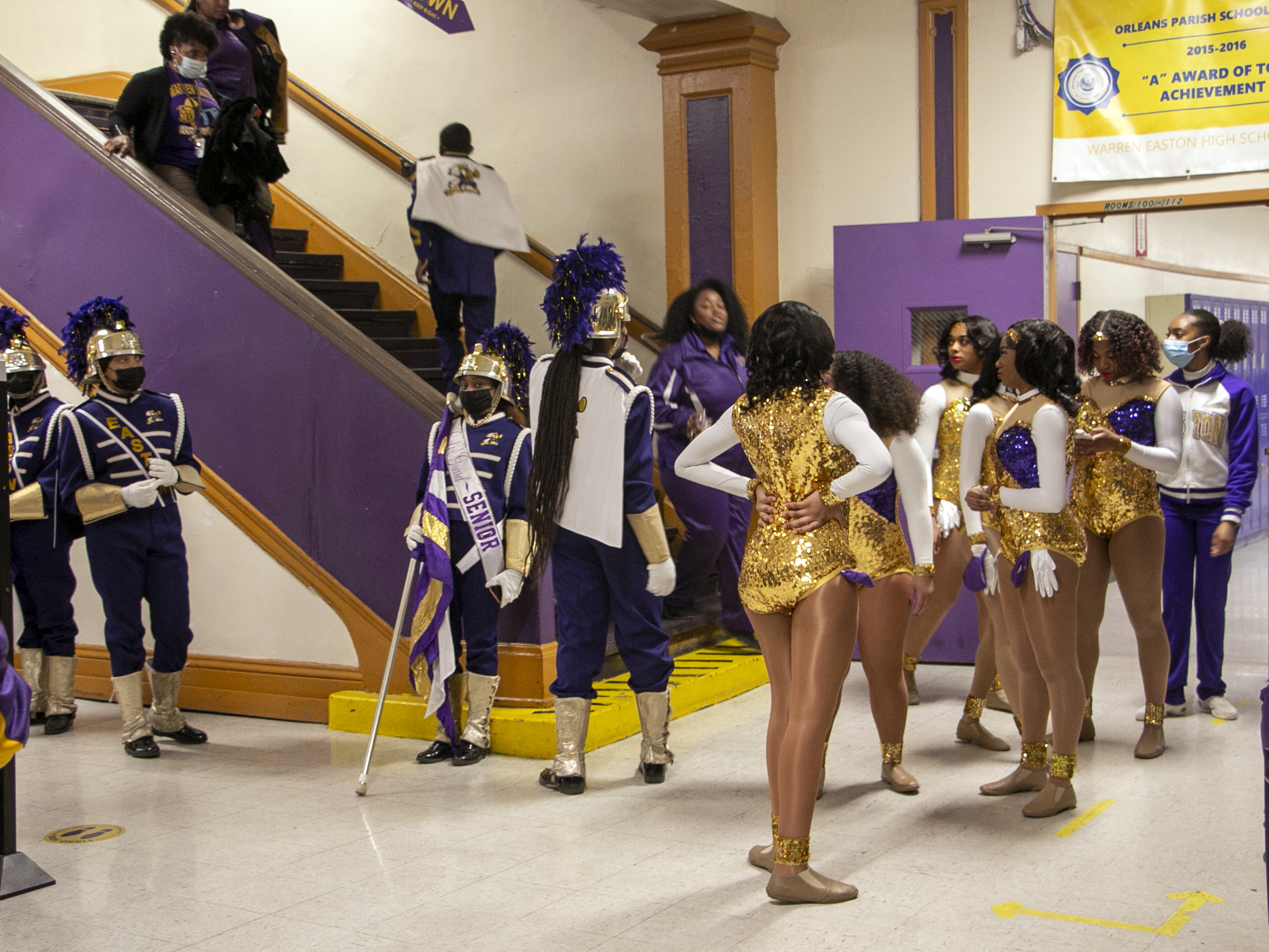 With the return of Mardi Gras marching bands, New Orleans' streets are full of magic 2 Warren Easton's color guard, majorettes and flag twirlers get ready to head to the school's first parade of the year.
