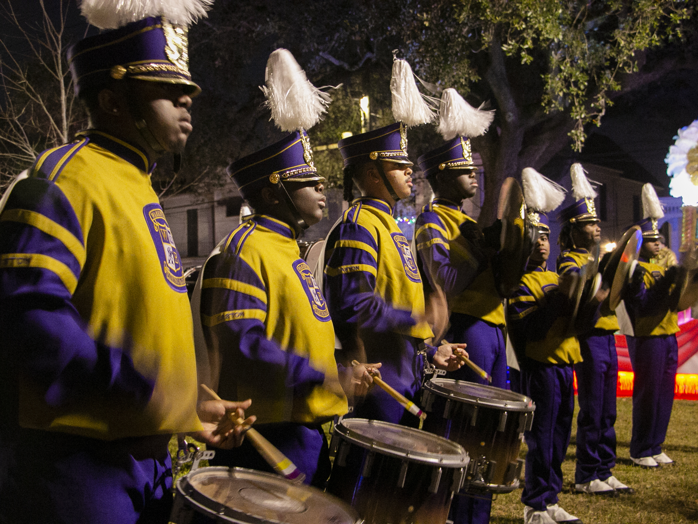 With the return of Mardi Gras marching bands, New Orleans' streets are full of magic 3 The snare drummers and cymbal players of Warren Easton battle another band while waiting for their first parade of the season to start.