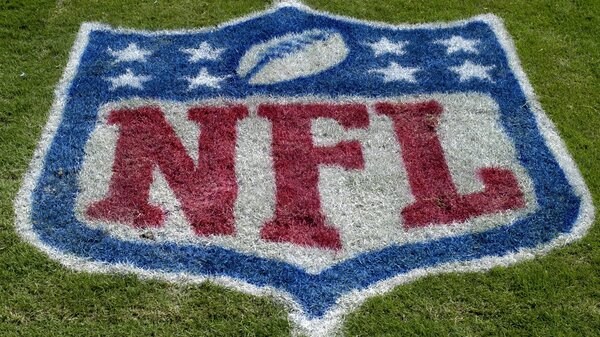 The NFL and players' union agree to suspend COVID protocols for the 2022 season.