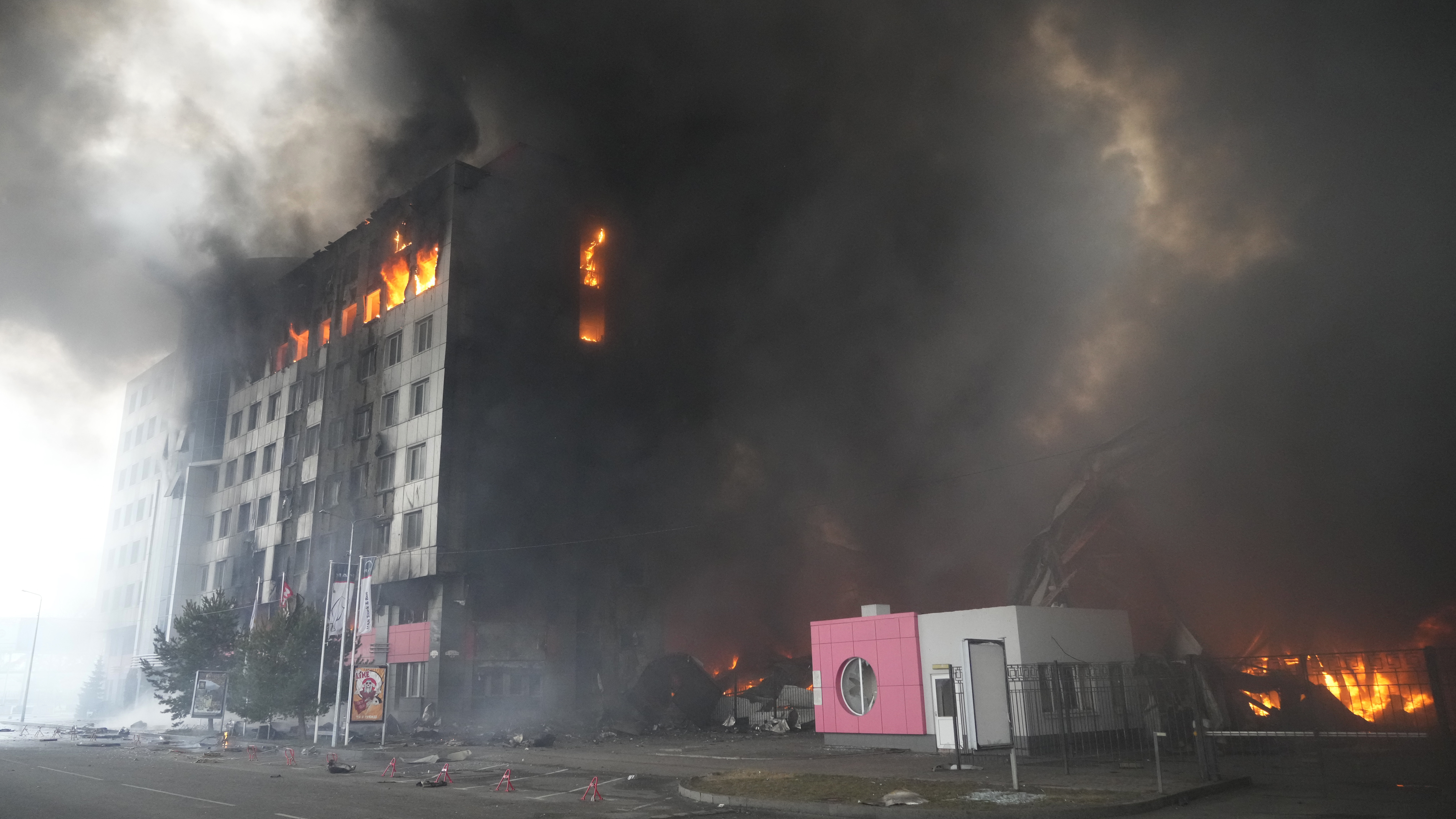 A building burns after shelling in Kyiv, Ukraine, March 3, 2022. Russian forces have escalated their attacks on crowded cities in what Ukraine
