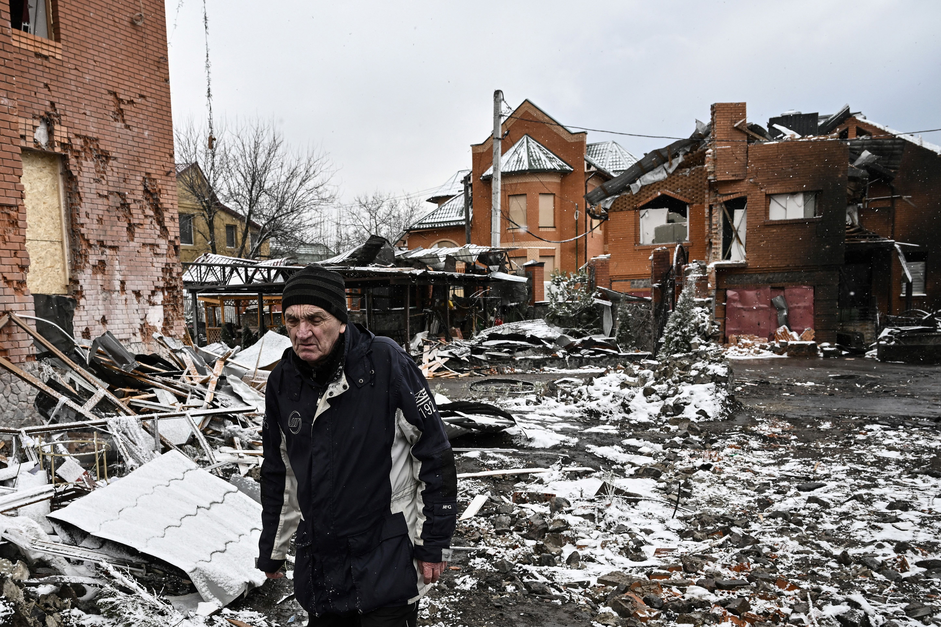 March 8: A man walks between houses destroyed during airstrikes on the central Ukrainian city of Bila Tserkva. Russia had stepped up its bombing campaign and missile strikes on Ukraine's cities.