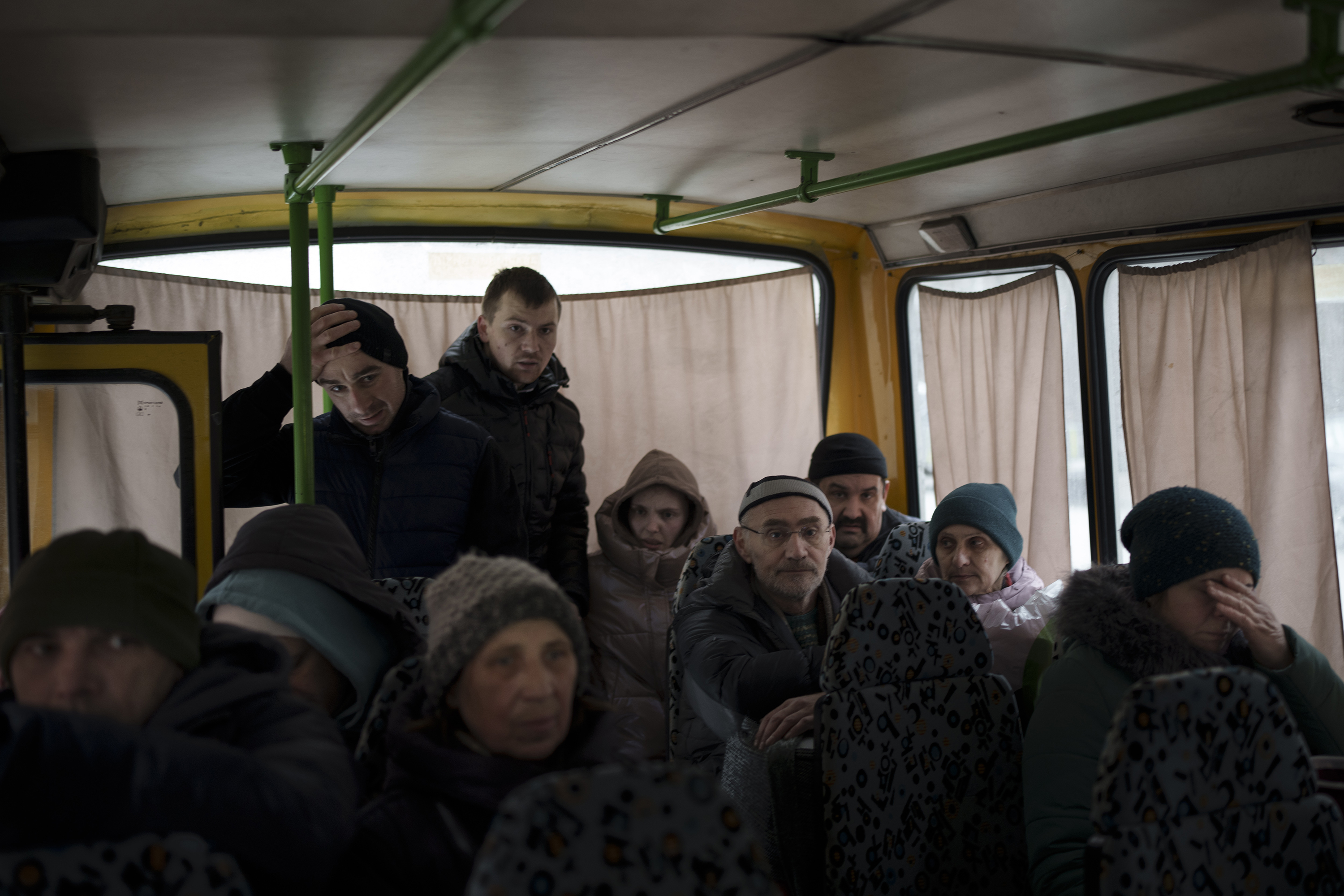 March 9: Ukrainians board a bus as they are evacuated from Irpin.