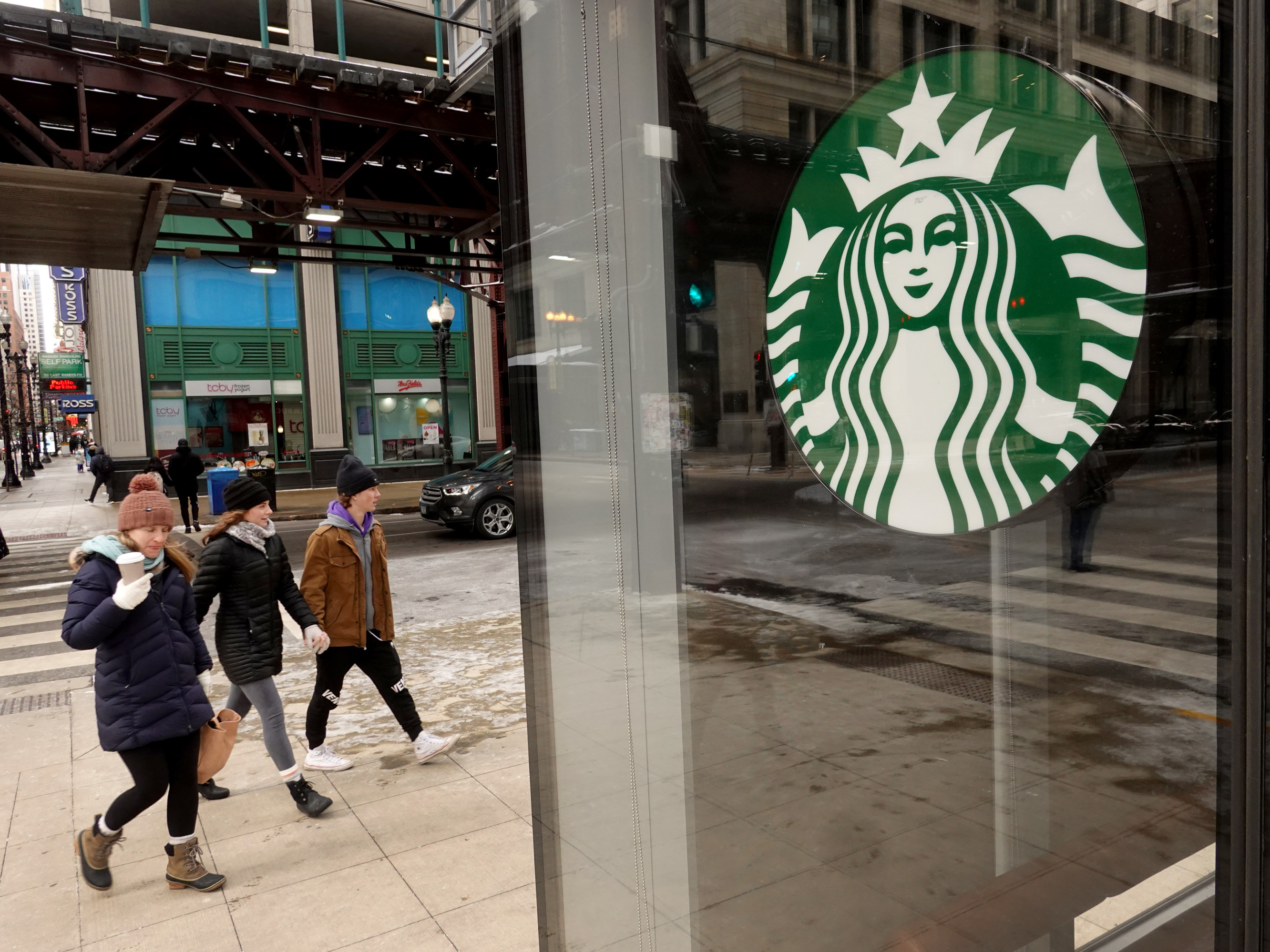 A Starbucks logo is seen on the window of one of the chain's coffee shops in Chicago, Illinois. Worker at the coffee shop have petitioned for a union vote, making it the first Starbucks in the Midwest to do so. (Getty Images)