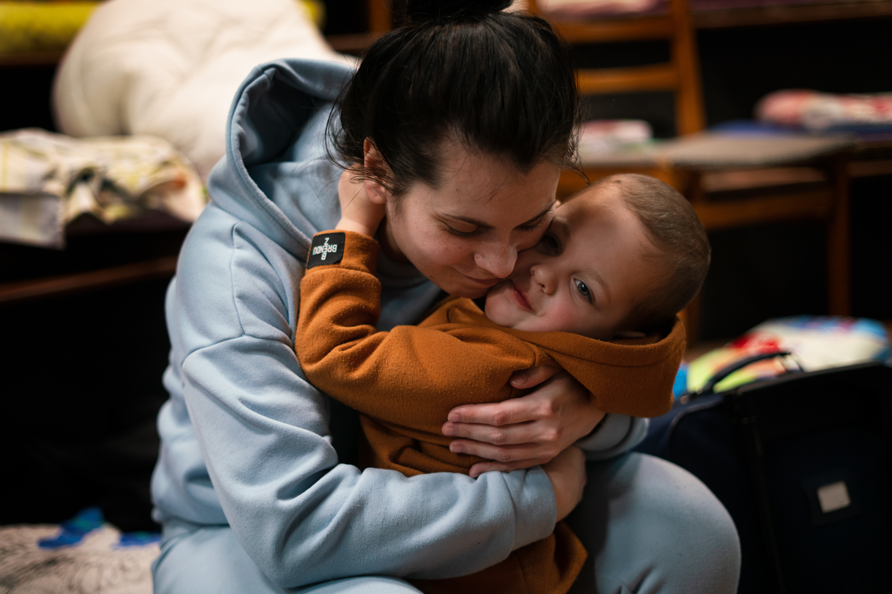 Nadia Kuzhukhar, 27, fled Kyiv with her sister and 2-year-old son, Maksim. They temporarily sheltered in the Church of St. Lazarus in Lviv, Ukraine. (NPR)