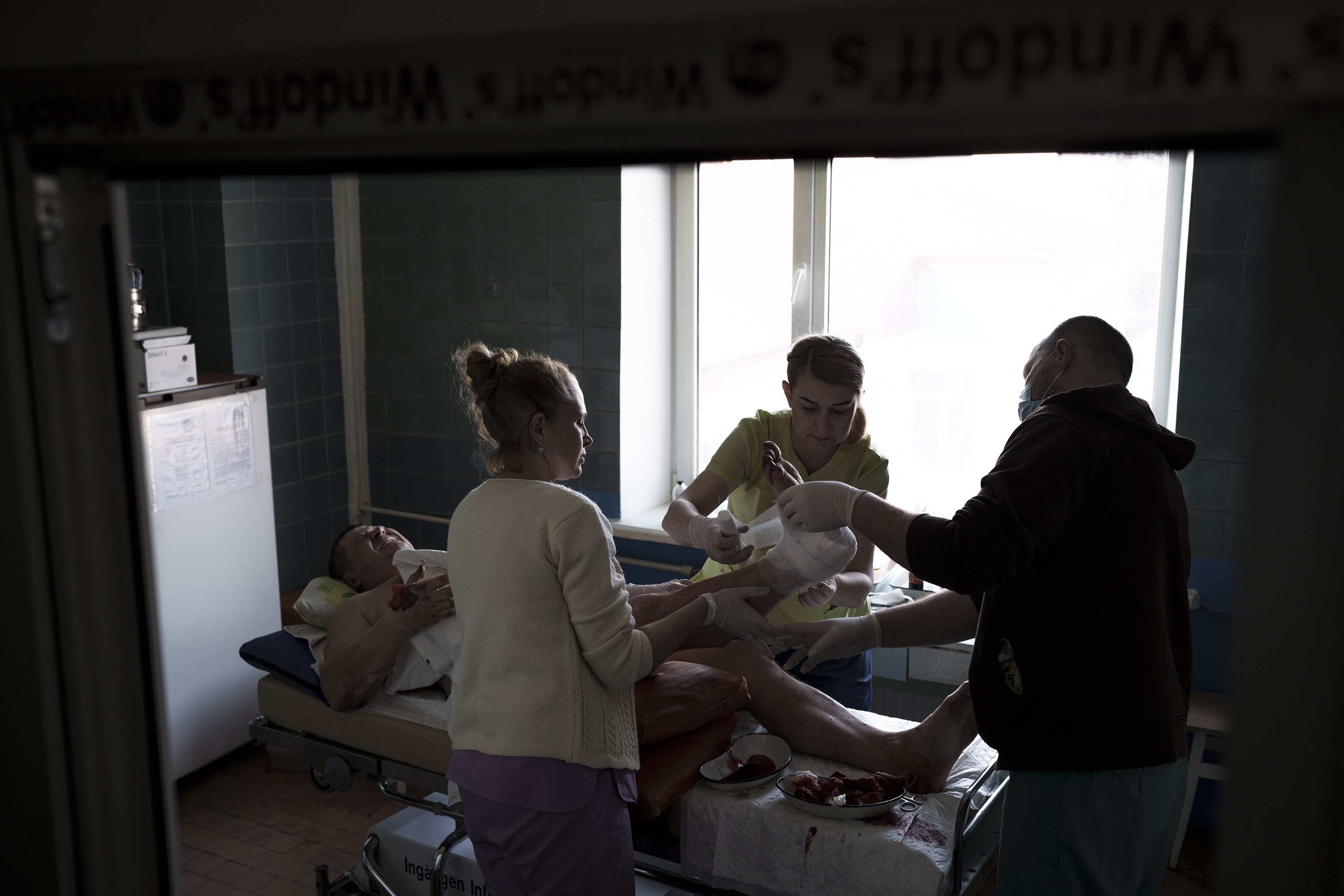 March 10: A man who was injured by shelling near his home is treated at a hospital in Brovary.