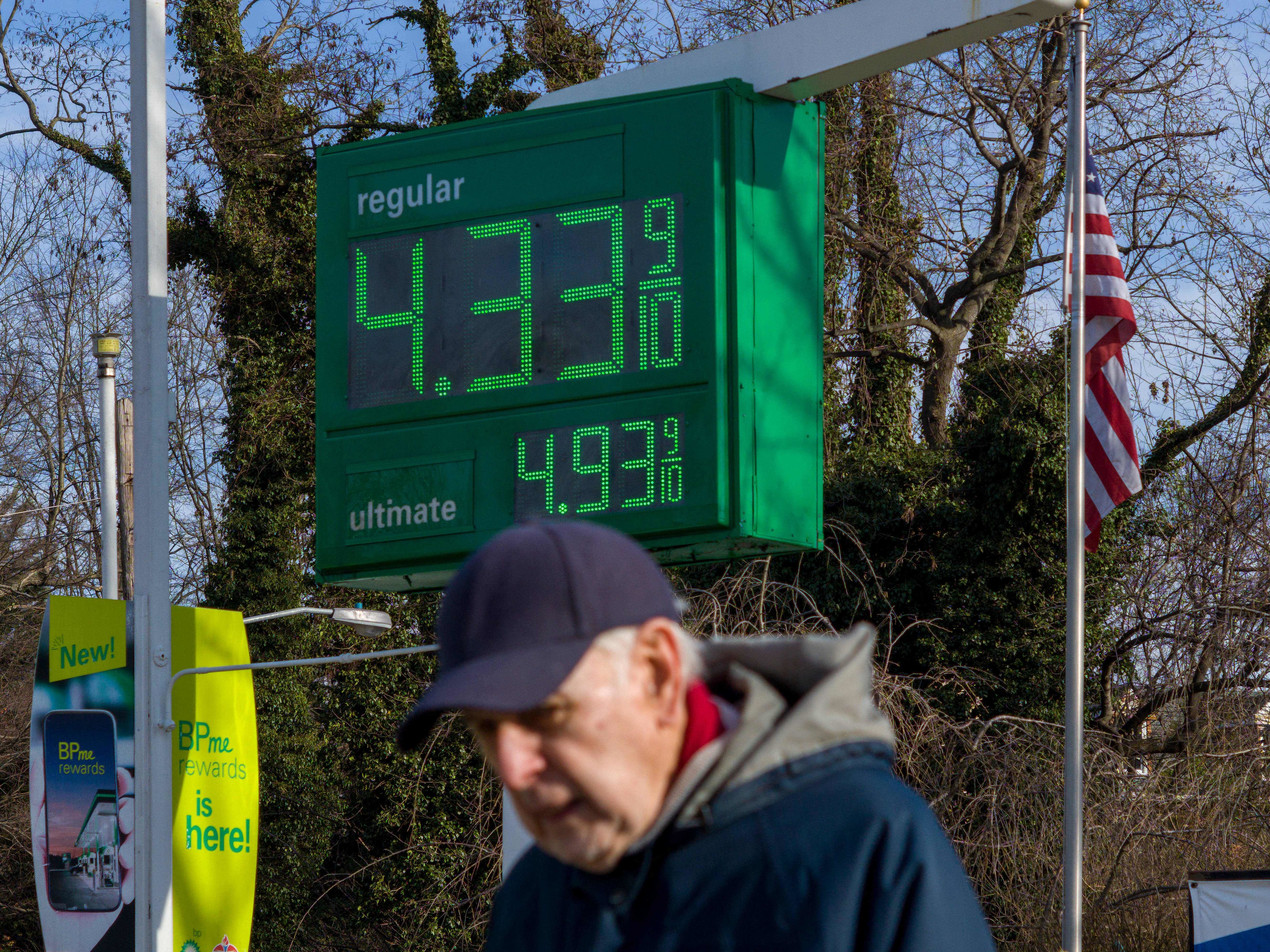 A sign shows the price of gas outside of a gas station in Washington, D.C, on March 8. Annual inflation is likely to have hit another 40-year high in February, yet the data won't fully capture the most recent surge in energy prices after Russia invaded Ukraine. (AFP via Getty Images)