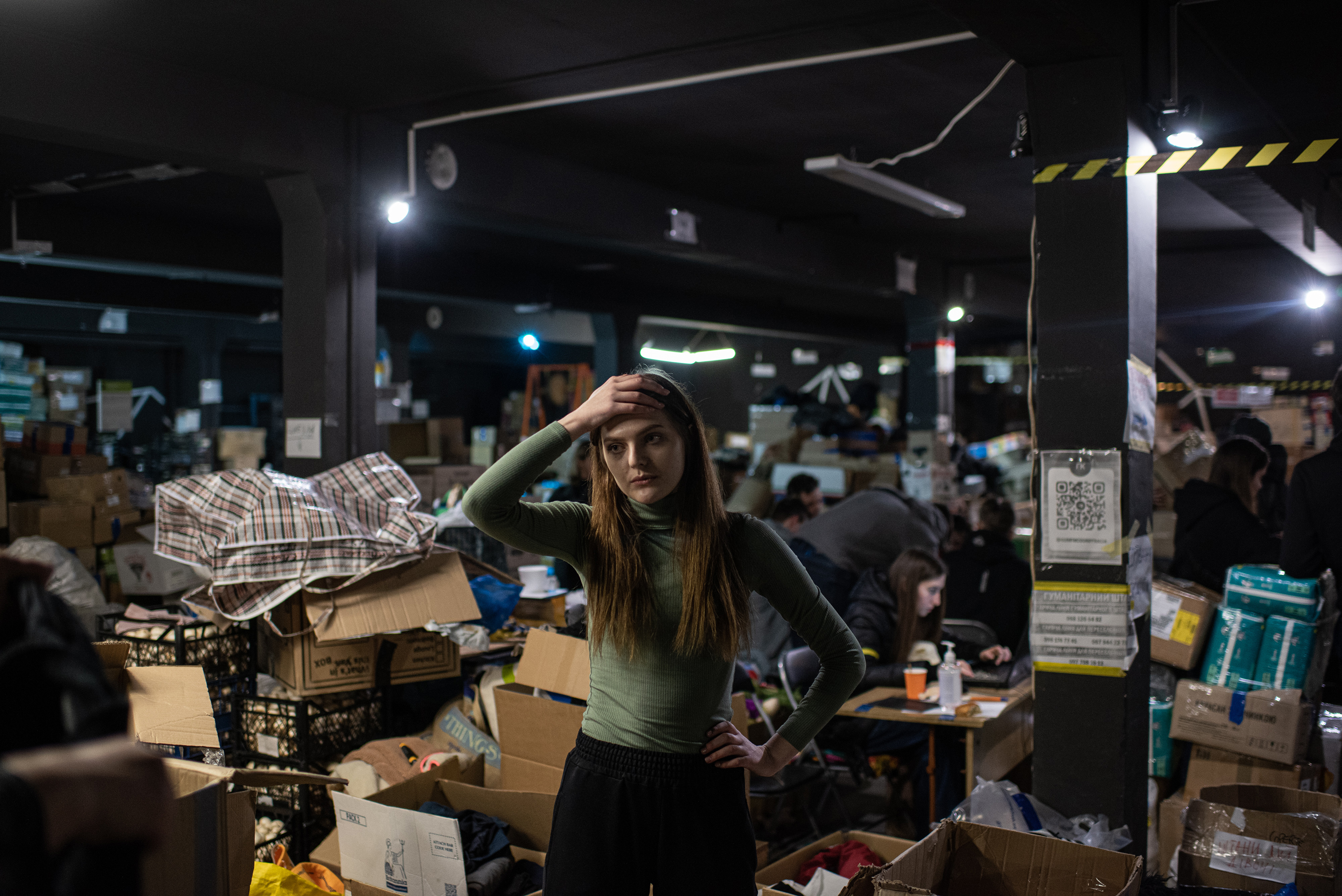 March 10: A volunteer takes a break in the Science Center in Ternopil, Ukraine. The center has become the a staging ground for volunteers to gather and distribute supplies for internally displaced persons, and to other cities and towns experiencing humanitarian catastrophe.