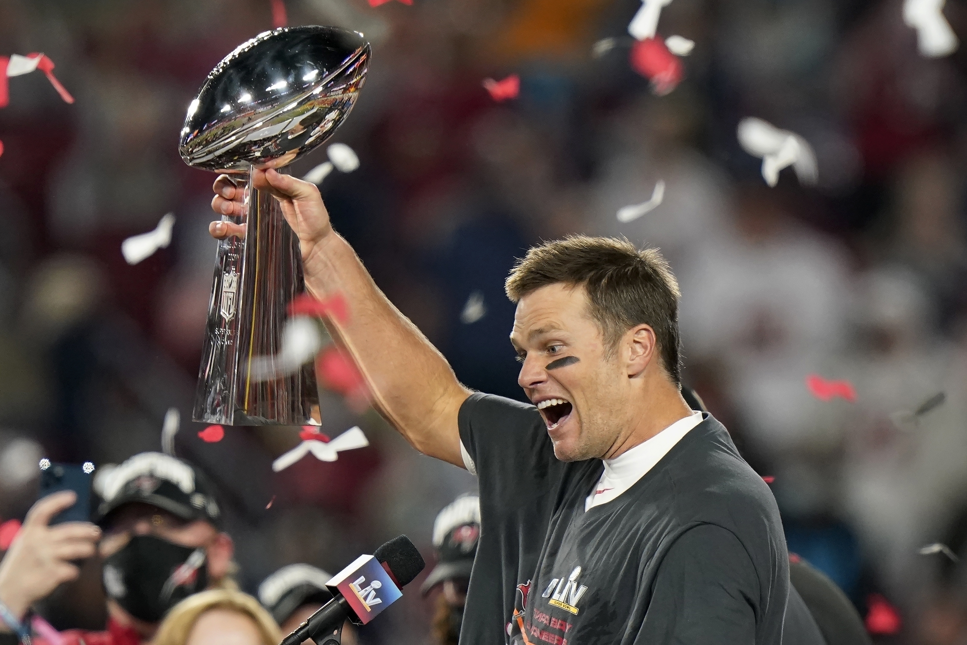 Tampa Bay Buccaneers quarterback Tom Brady celebrates with the Vince Lombardi Trophy after the team's NFL Super Bowl 55 football game against the Kansas City Chiefs in Tampa, Fla. (AP)