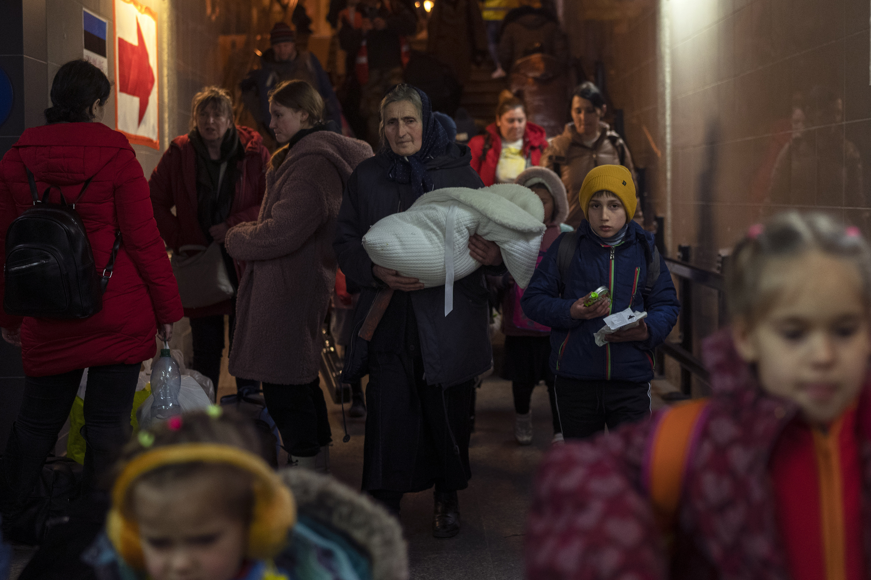 March 15: People who fled the war in Ukraine leave the train station in Przemysl, Poland.