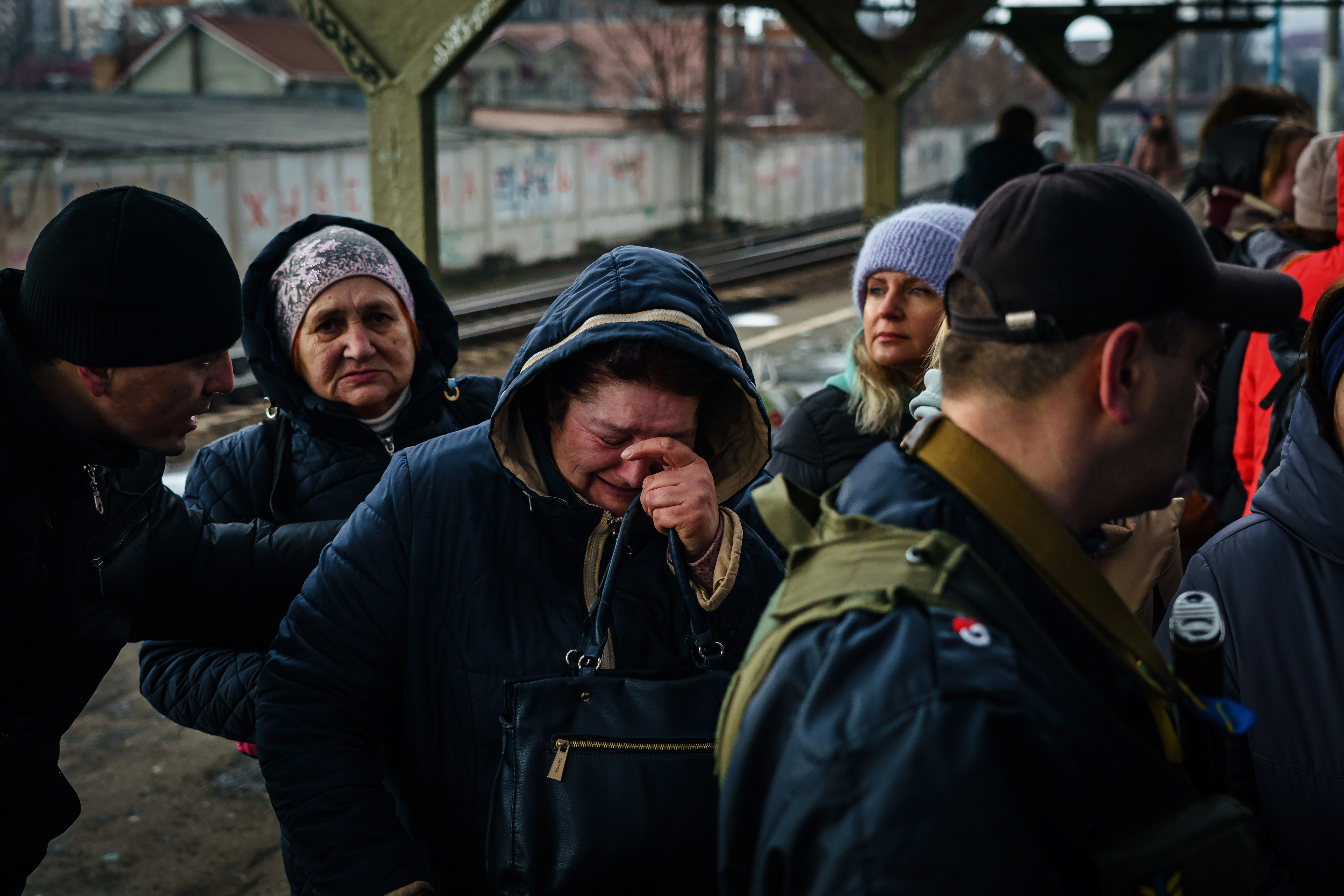 A woman breaks down in tears as she realizes she is getting to board an evacuating train. Hundreds of civilians, mostly women and children rush to evacuate on one of the last trains out of town as the sounds of battle Ð gunfire and bombing Ð fighting between Russian and Ukrainian forces draw closer to the city of Irpin, Ukraine, Friday, March 4, 2022.