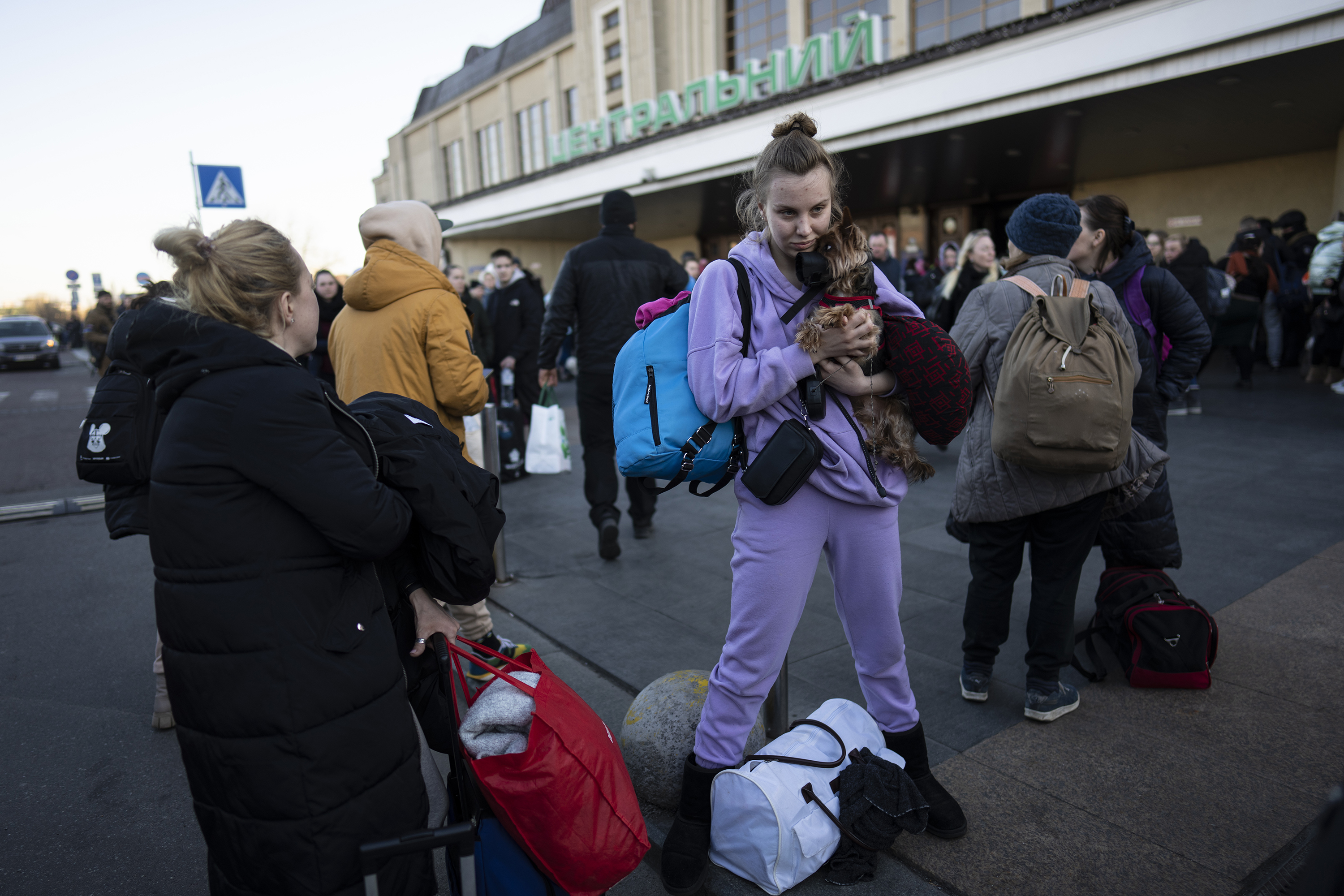 March 21: Daryna Kovalenko, 19, holds her dog, Tim, at Kyiv's train station after leaving her home in Chernihiv, Ukraine, through a humanitarian corridor.