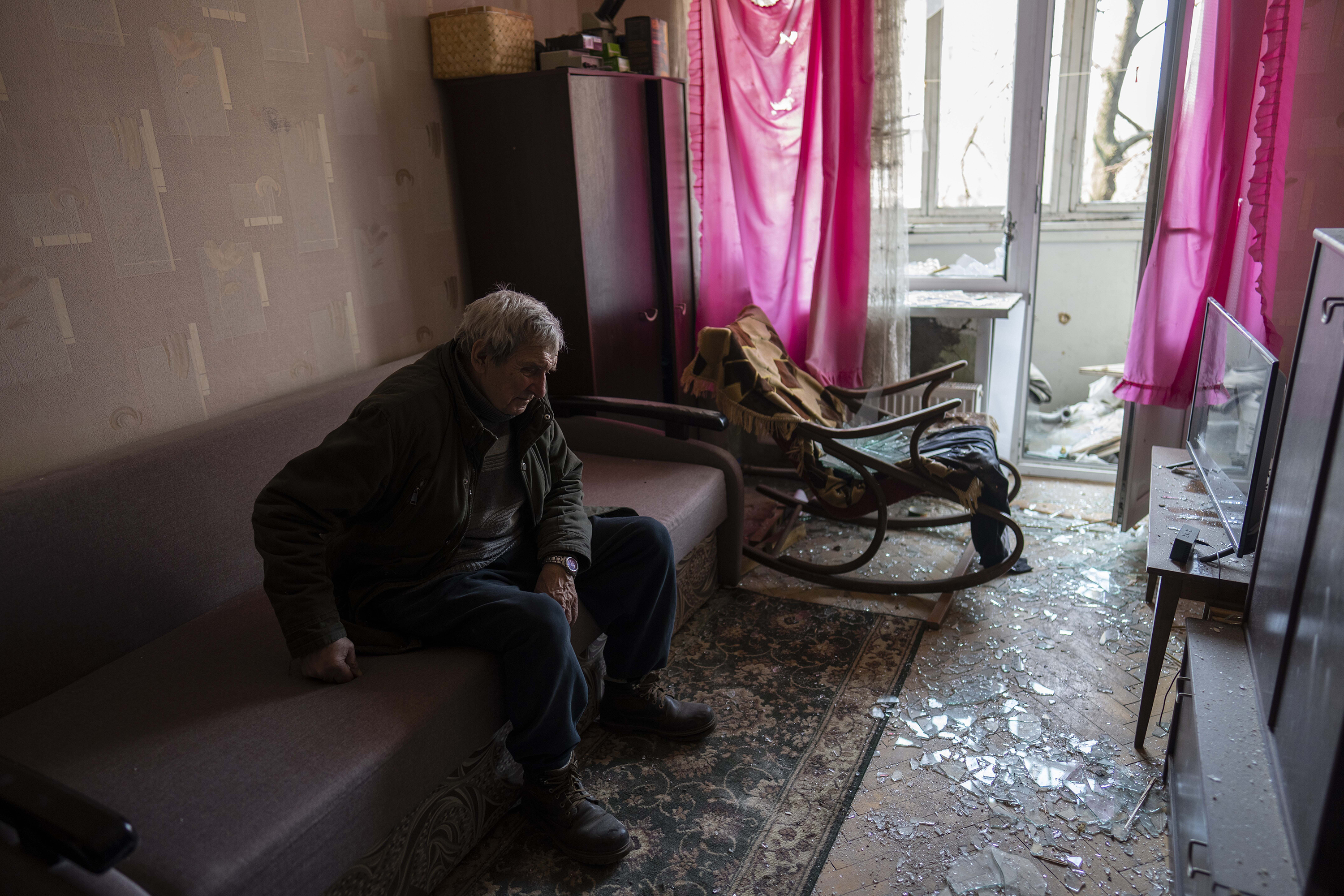 March 23: Volodymyr, 80, rests inside his apartment after it was damaged by shelling in Kyiv.