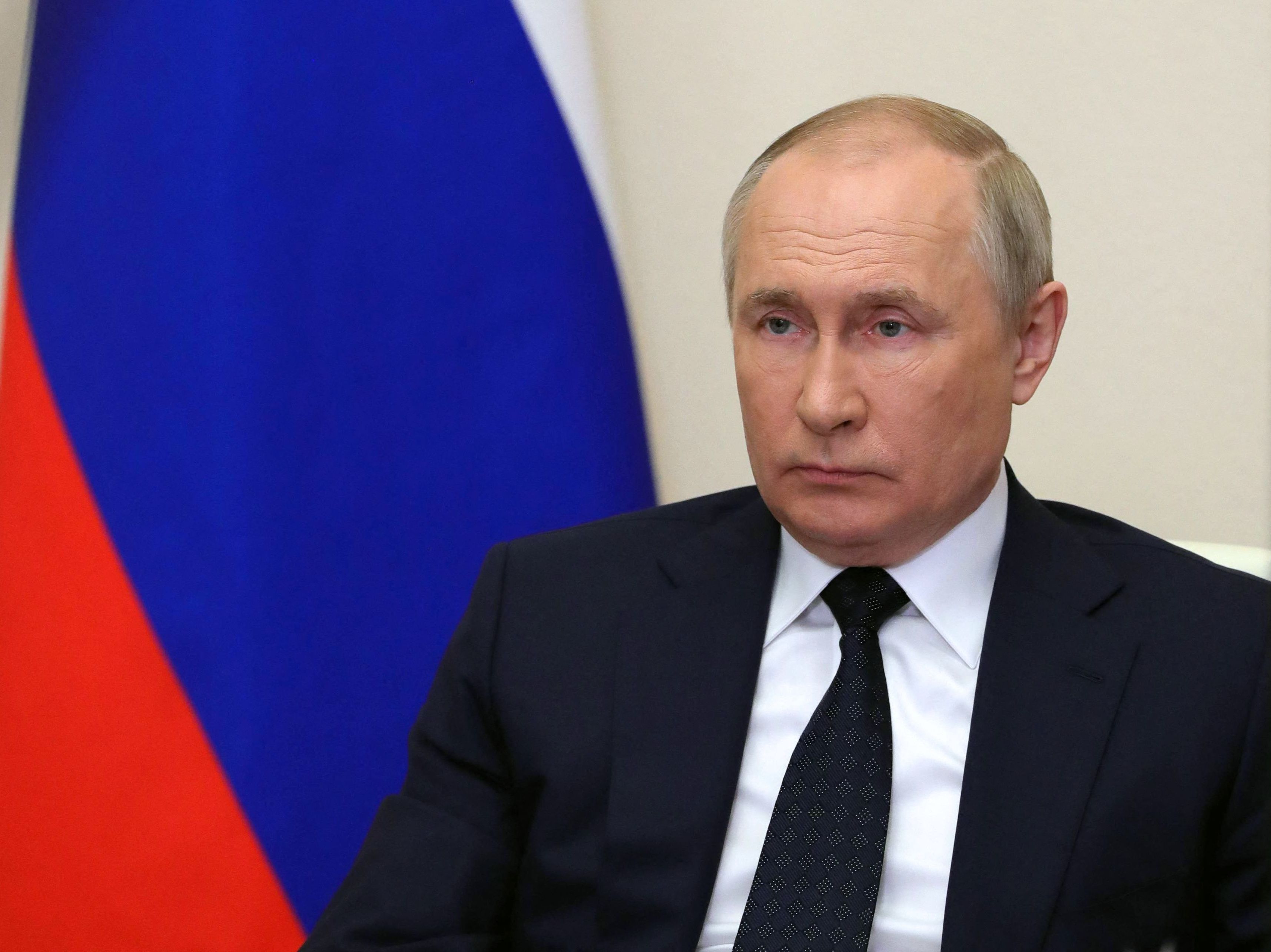 Russian President Vladimir Putin chairs a government meeting via a video link at the Novo-Ogaryovo state residence outside Moscow on Wednesday. Putin said Russia will only accept payments in rubles for gas deliveries to &quot;unfriendly countries,&quot; which include all EU members and the U.S. (Sputnik/AFP via Getty Images)