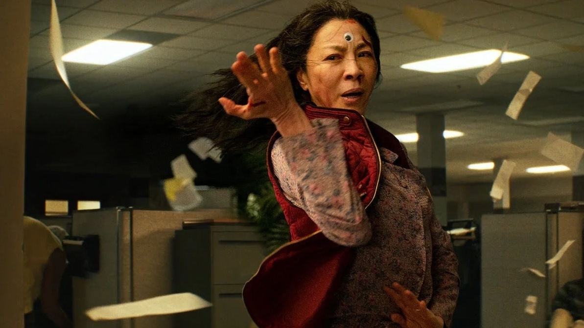 Michelle Yeoh stars as a woman who suddenly develops the power to leap between parallel universes in the action-adventure-fantasy Everything Everywhere All at Once.