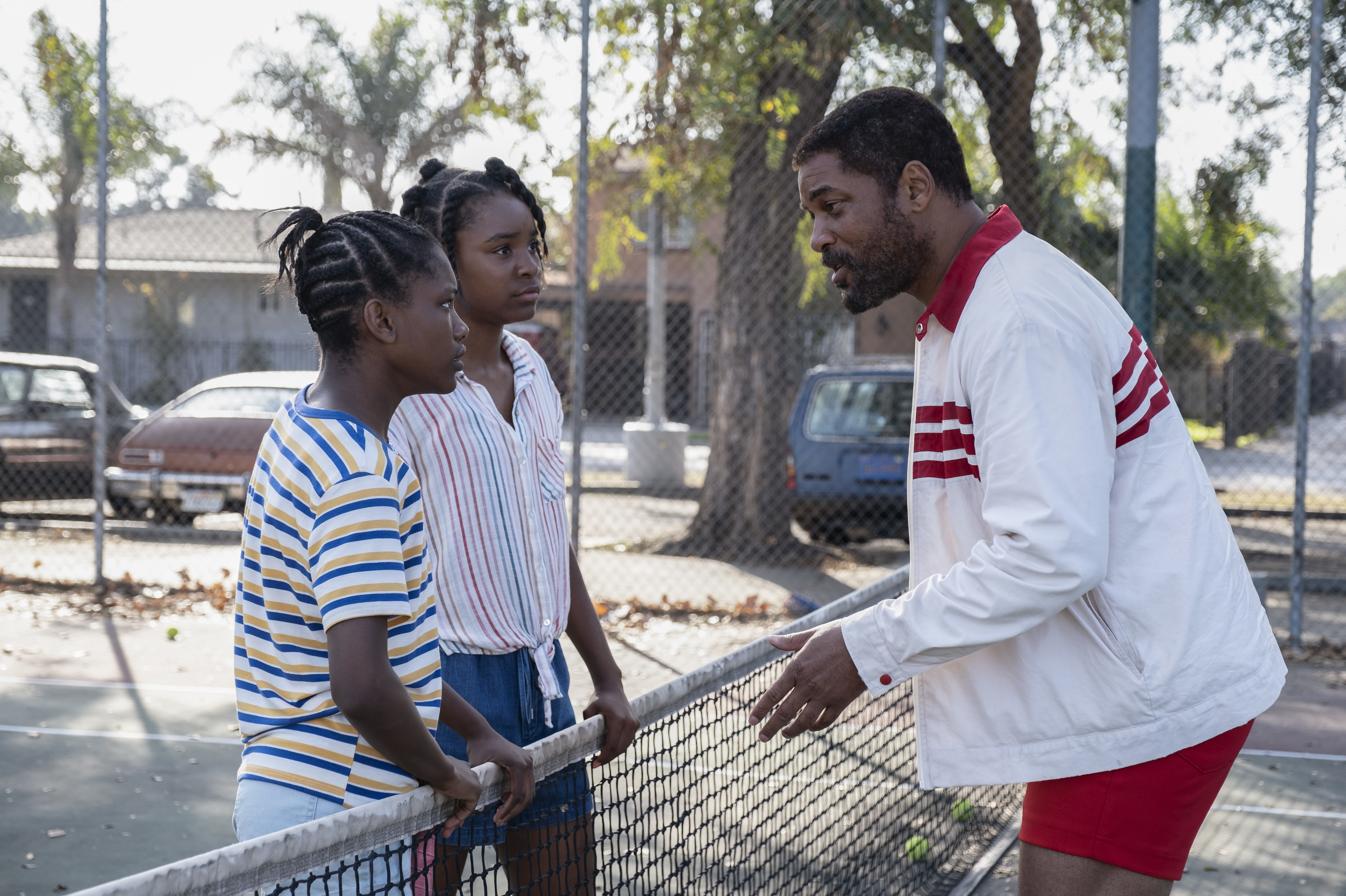 Demi Singleton and Saniyya Sidney with Will Smith in <em>King Richard.</em> (Warner Bros. Entertainment Inc.)