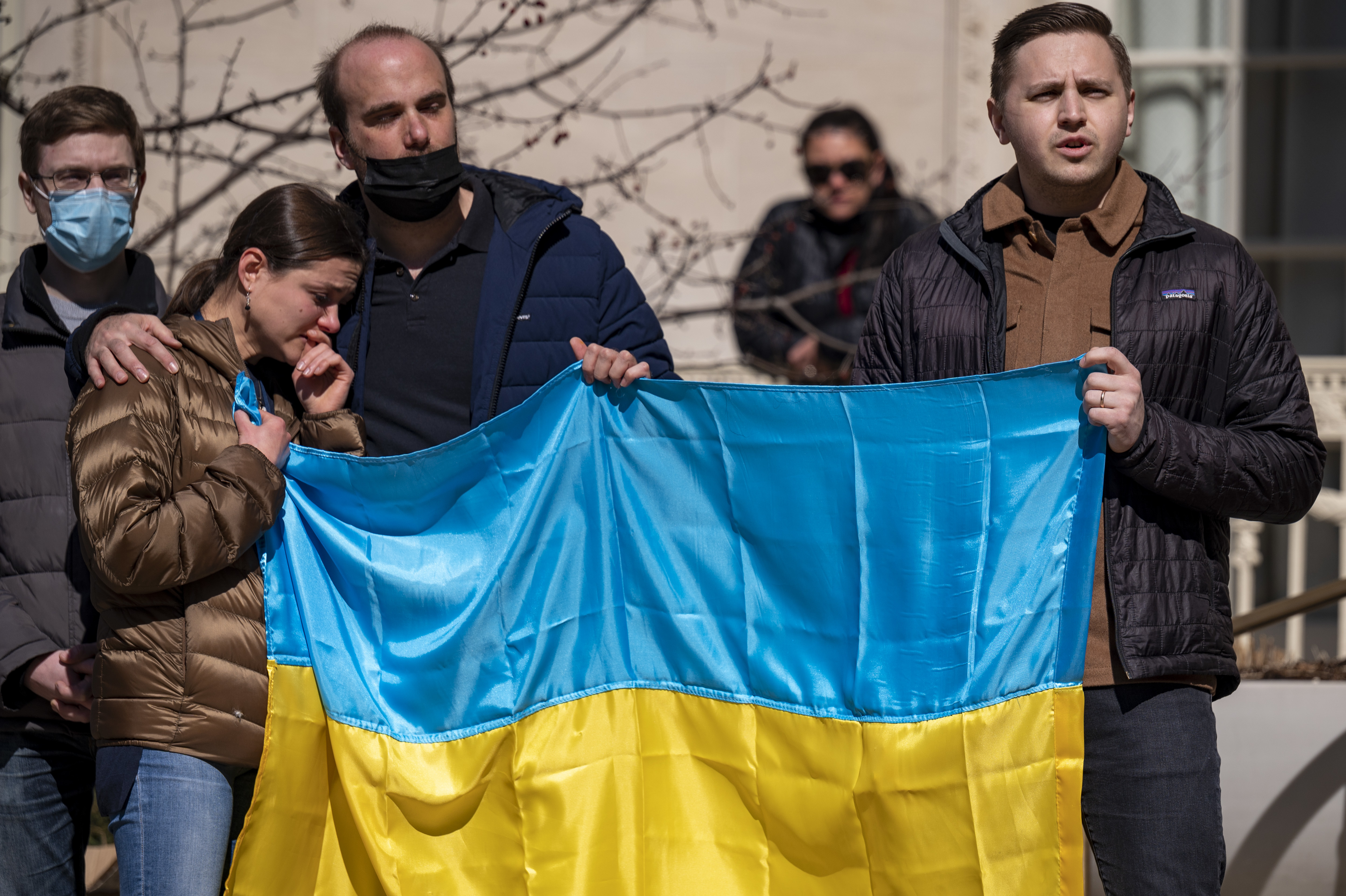 March 3: Vasyl Matsyuk joins in quiet song as the Ukrainian national anthem is played before a crowd on Yale University's campus.