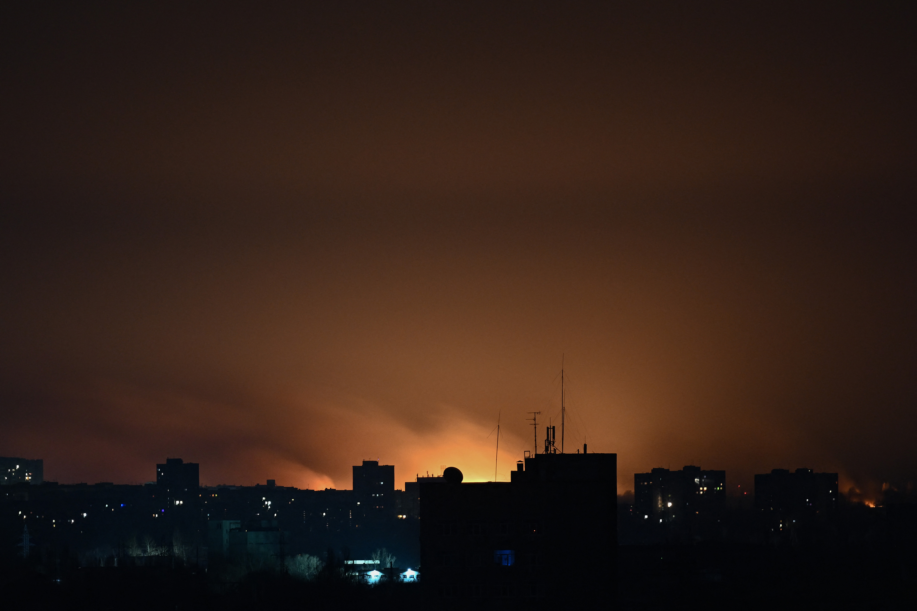 March 24: Fire and smoke lights up the sky, east of Kharkiv.