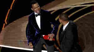 Will Smith appears to slap Chris Rock following Oscars joke about Jada Pinkett Smith