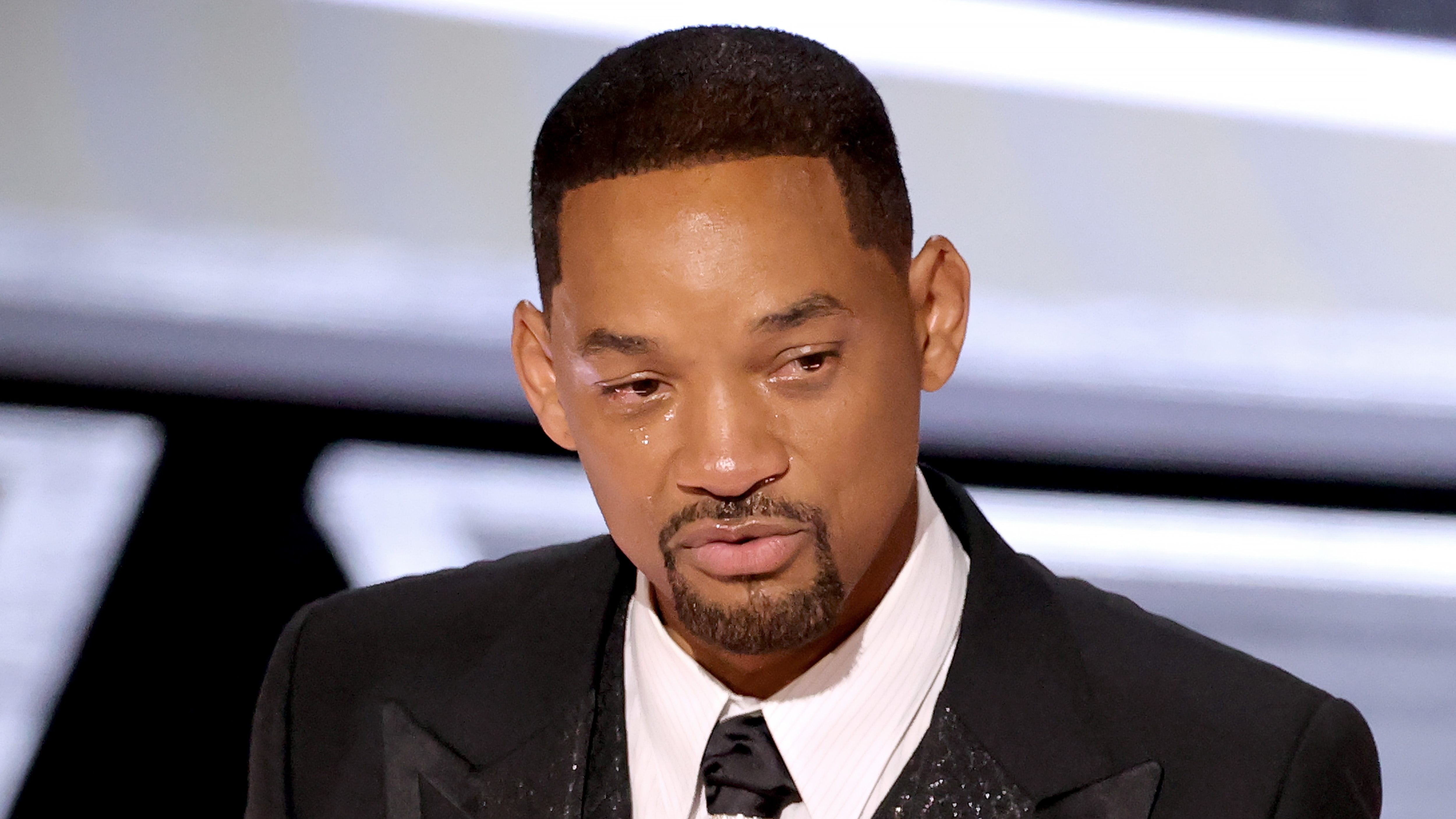 Will Smith tearfully accepts a best actor Oscar for his role in <em>King Richard</em>. Earlier in the ceremony Smith slapped Chris Rock onstage. (Getty Images)