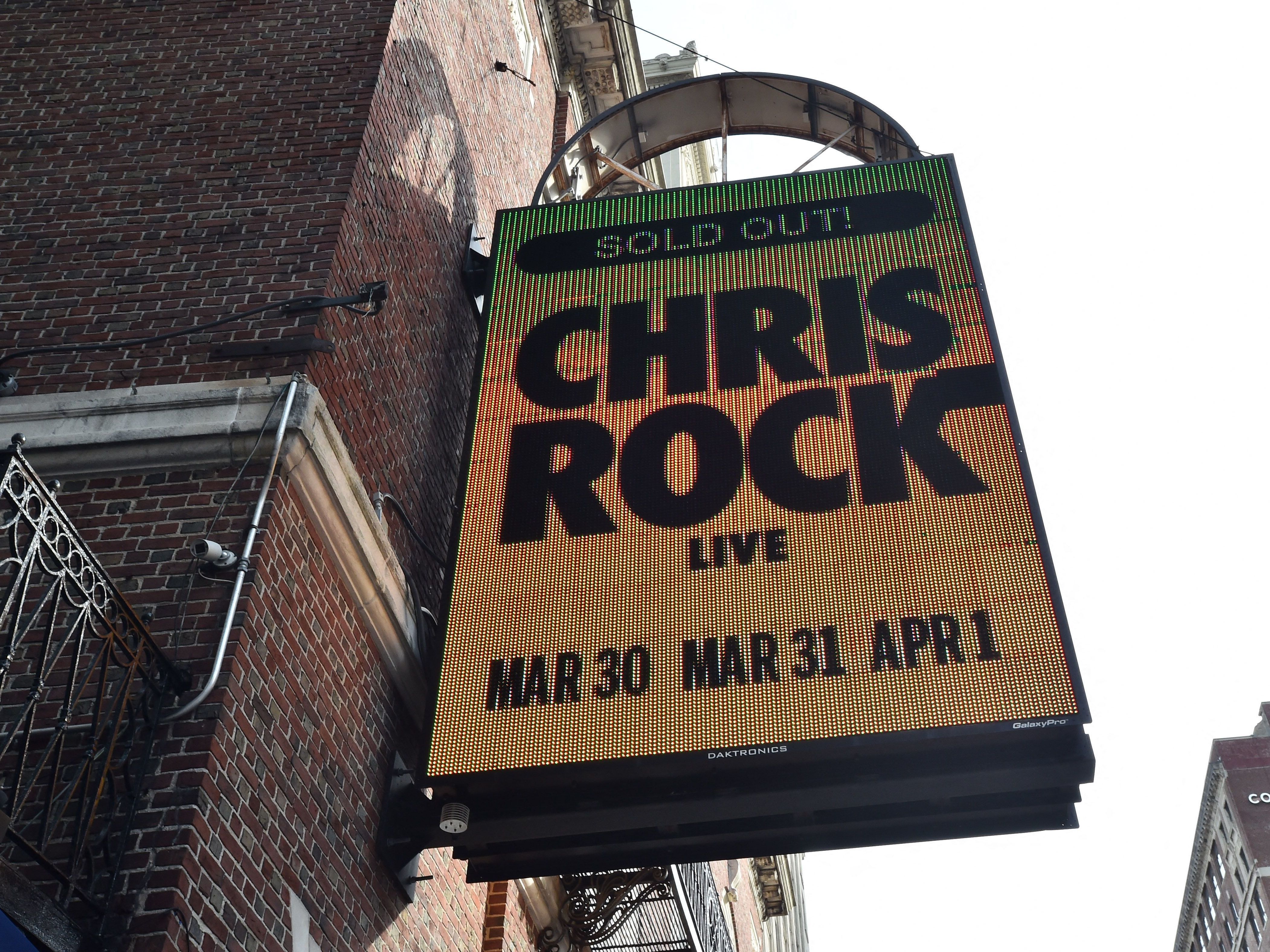 The marquee at the Wilbur Theatre advertises a sold out performance by US comedian Chris Rock in Boston, Massachusetts on March 30. (AFP via Getty Images)