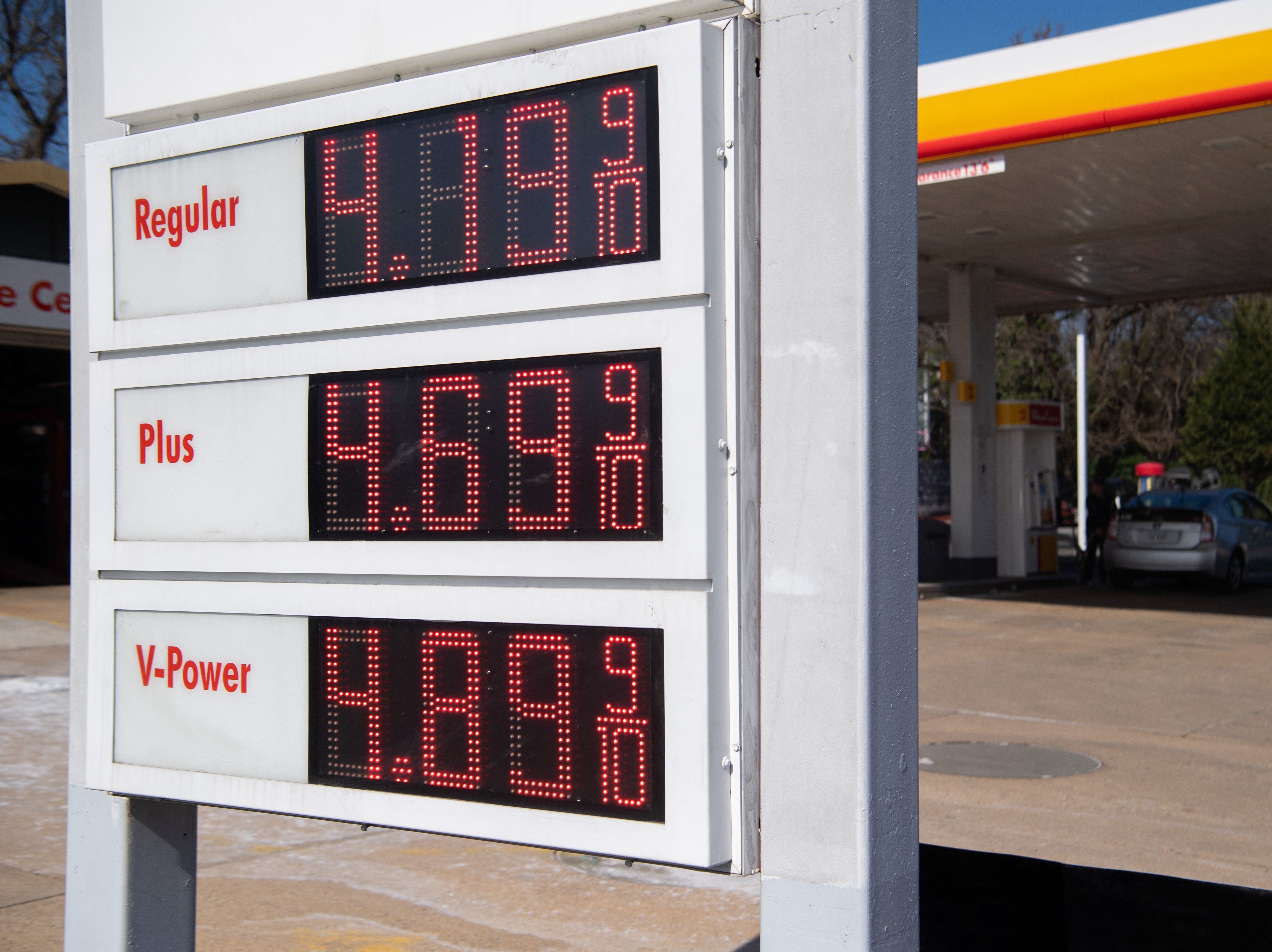 A sign displays fuel prices at a gas station in Arlington, Va., on March 16. President Biden announced on Thursday the country's largest-ever release from its Strategic Petroleum Reserve. (AFP via Getty Images)