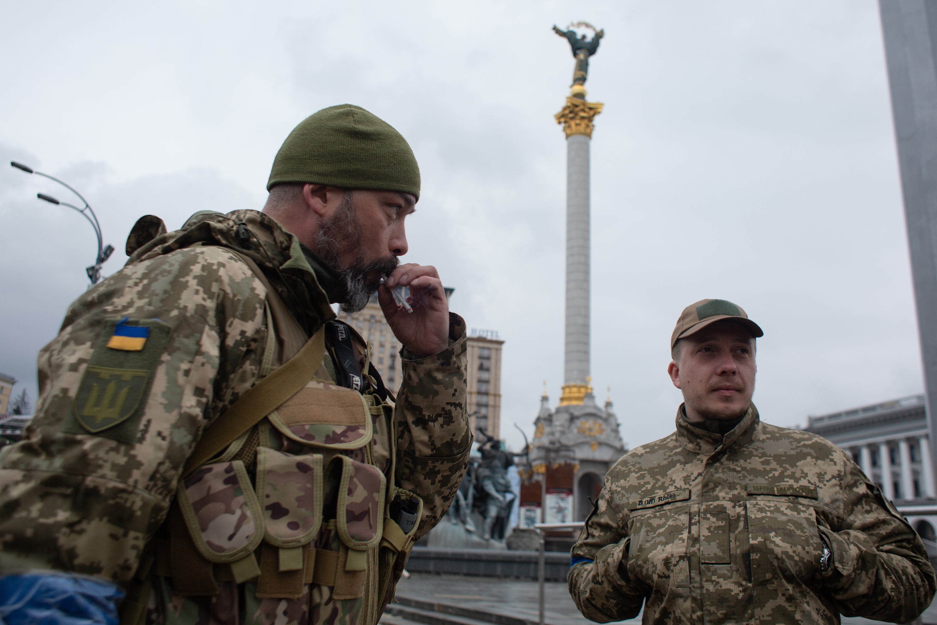 March 30: Ukrainian servicemen staff a checkpoint in Kyiv. Local officials reported fresh attacks on the outskirts of Kyiv despite Tuesday's announcement that Russia would "reduce military operations" around the capital. Ukraine and other countries regarded the announcement skeptically.