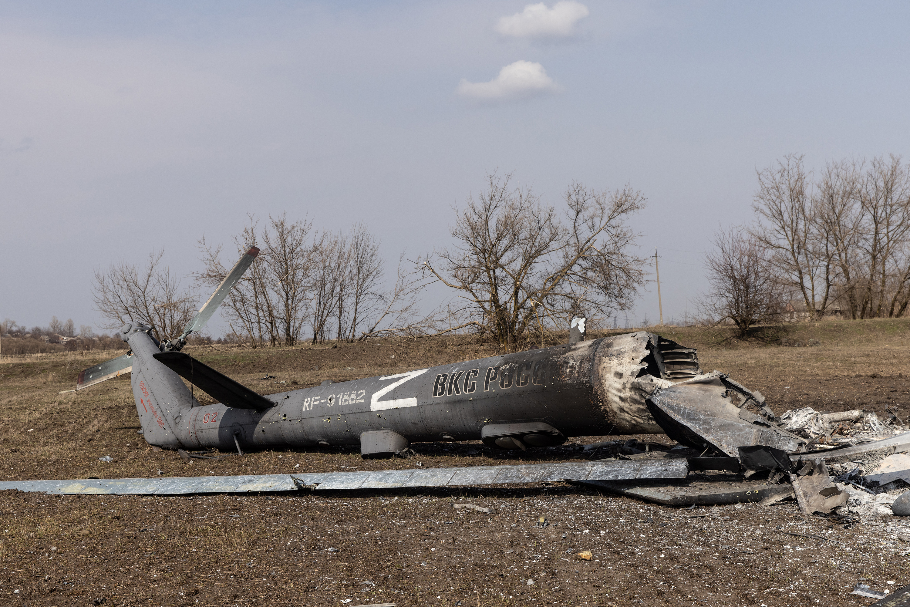 March 31: A "Z" is seen painted on the wreckage of a downed Russian helicopter in Malaya Rohan, Ukraine.