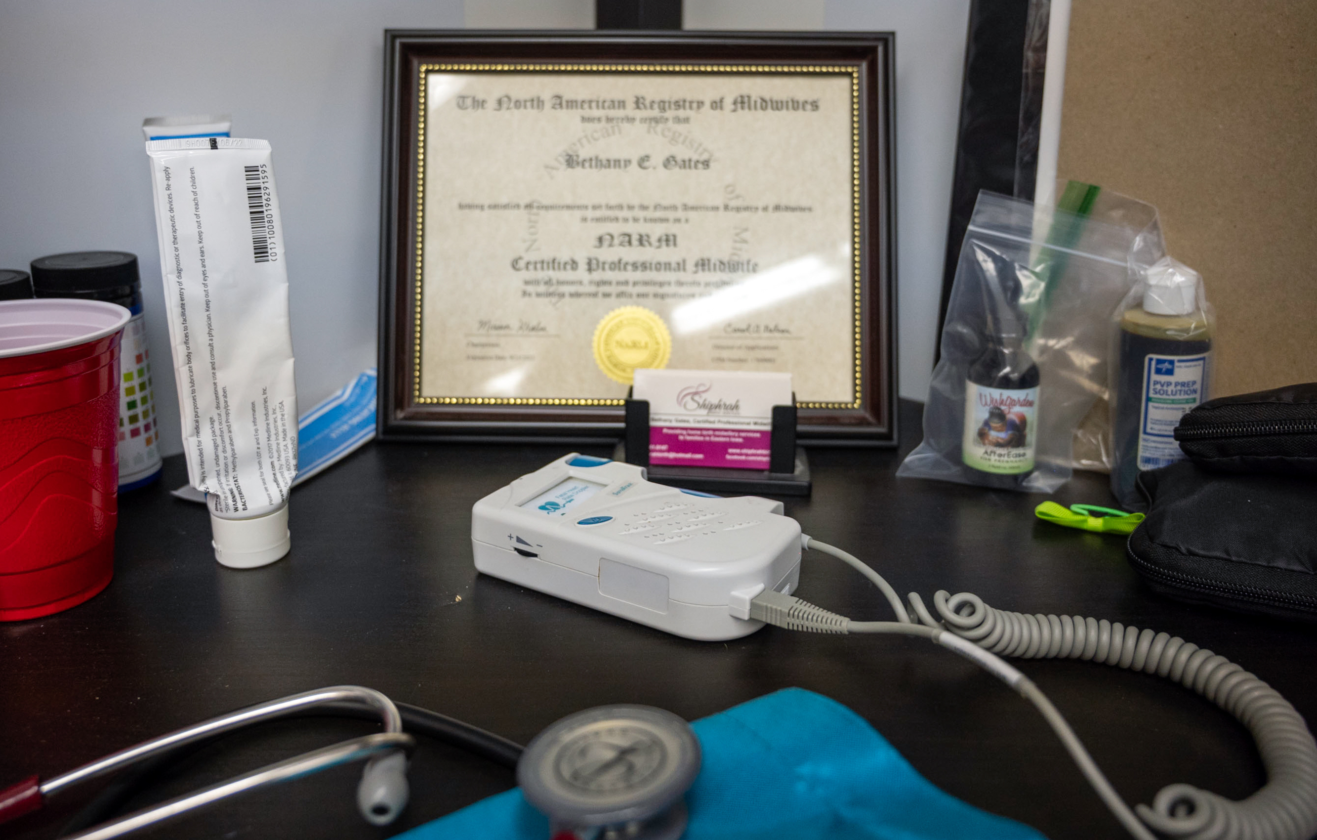 Bethany Gates' desk contains her certification from the North American Registry of Midwives, the organization that approves courses for certified professional midwives.