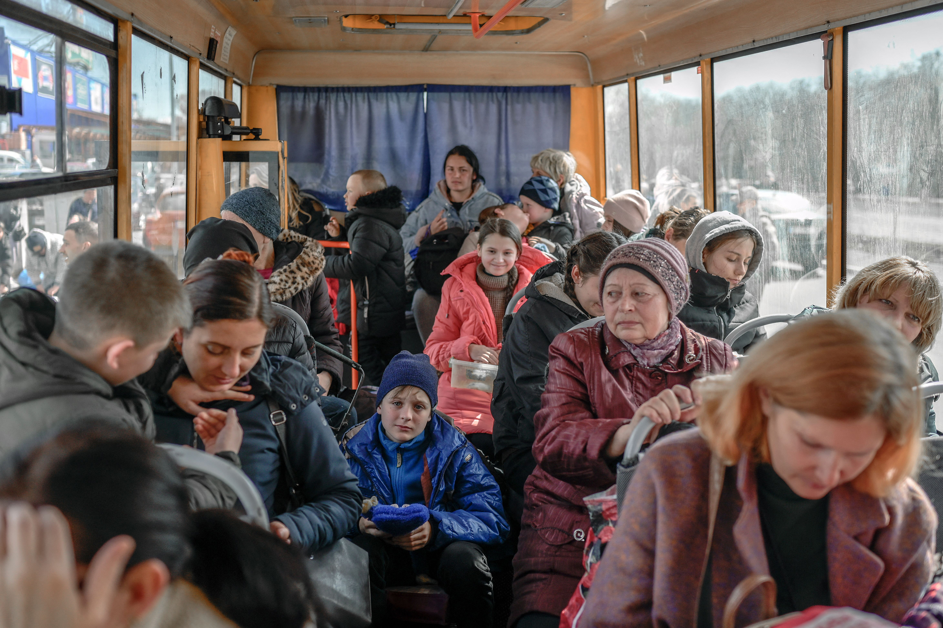Internally displaced people arrive at a center in Zaporizhzhia, northwest of Mariupol, on Wednesday. (Bulent Kilic/AFP/Getty Images)