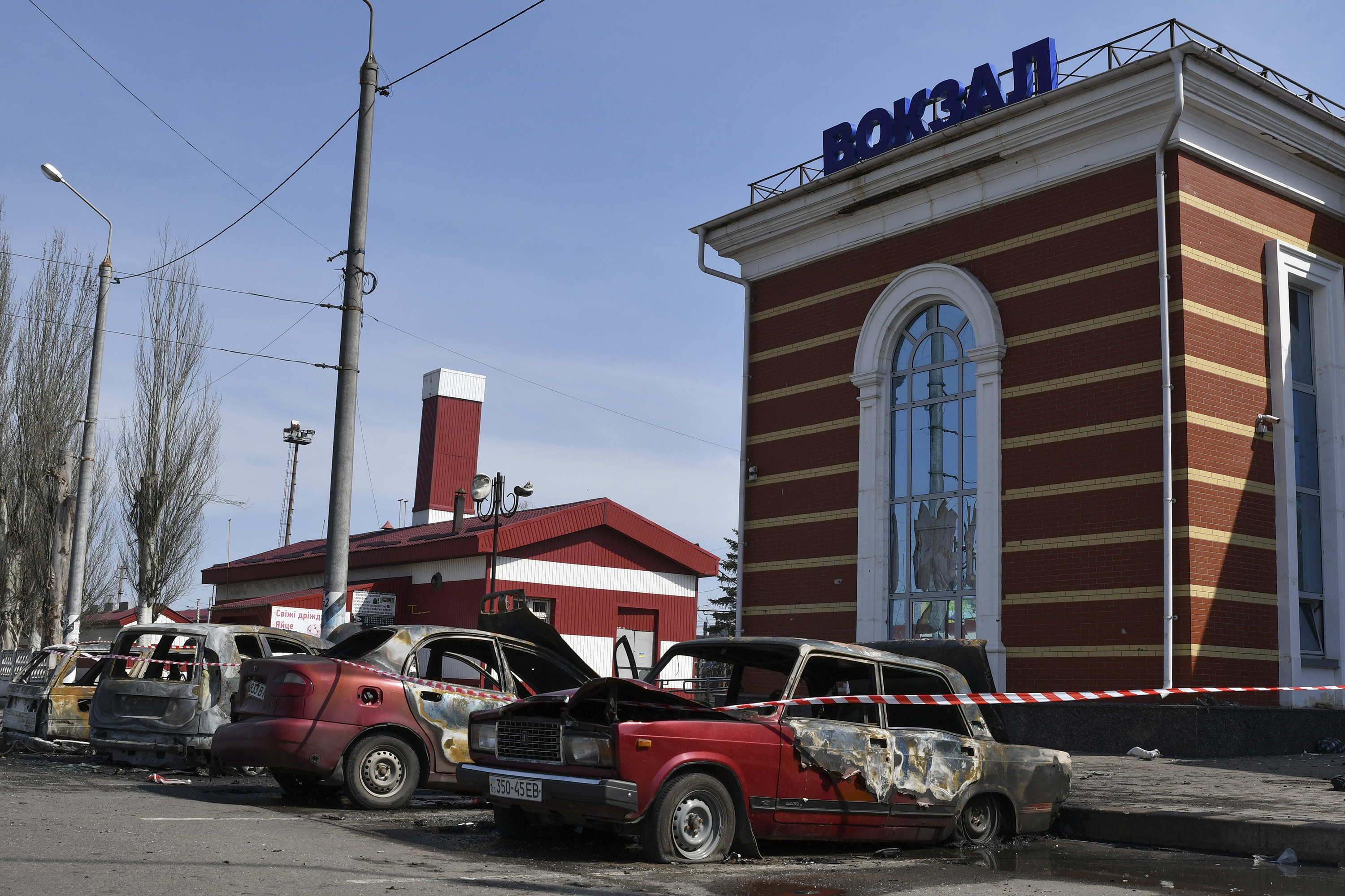 April 8: Cars sit in front of a train station damaged by Russian shelling in Kramatorsk, in eastern Ukraine.