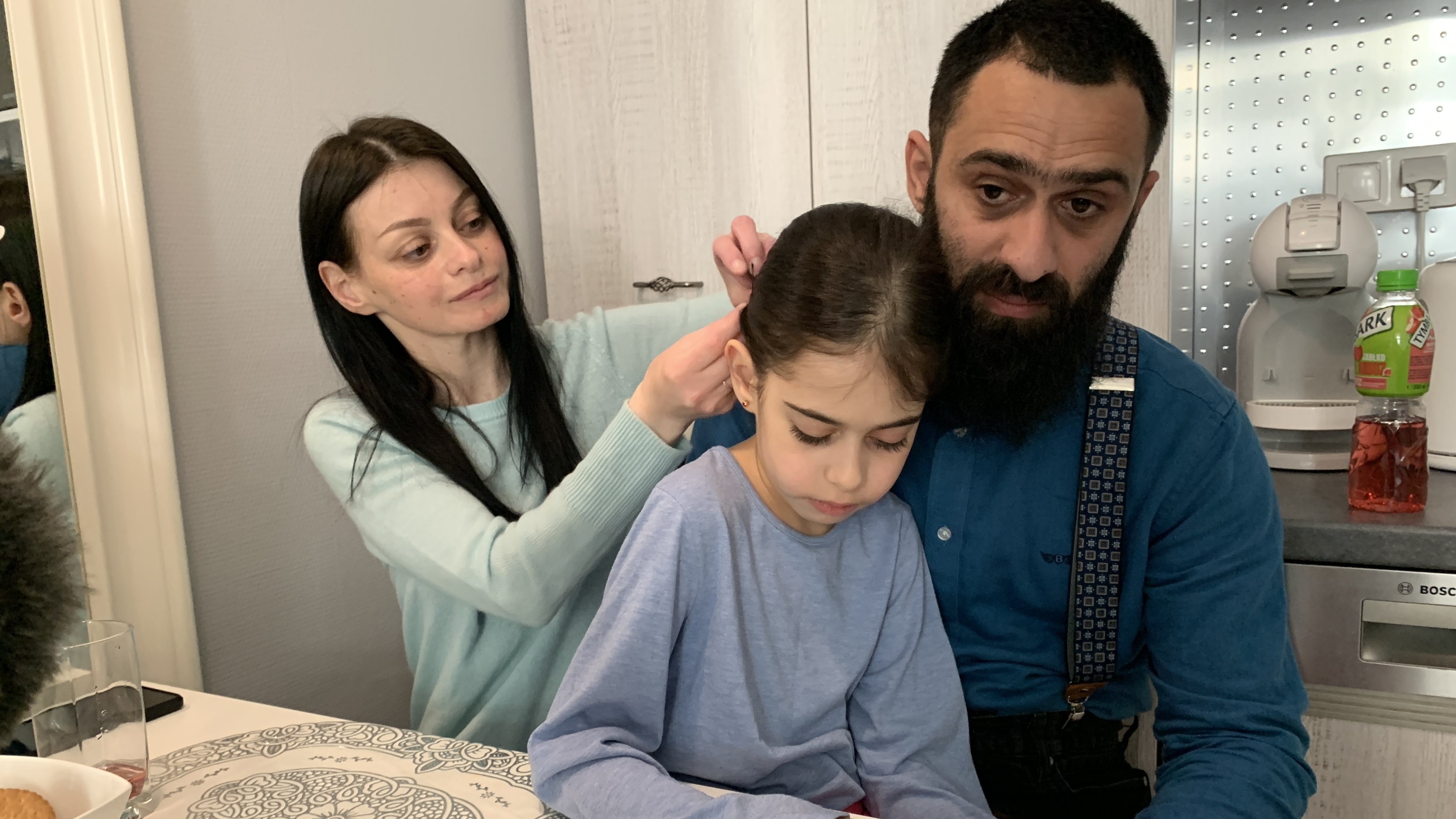 Even with ties, Ukrainian families struggle to reach the United States