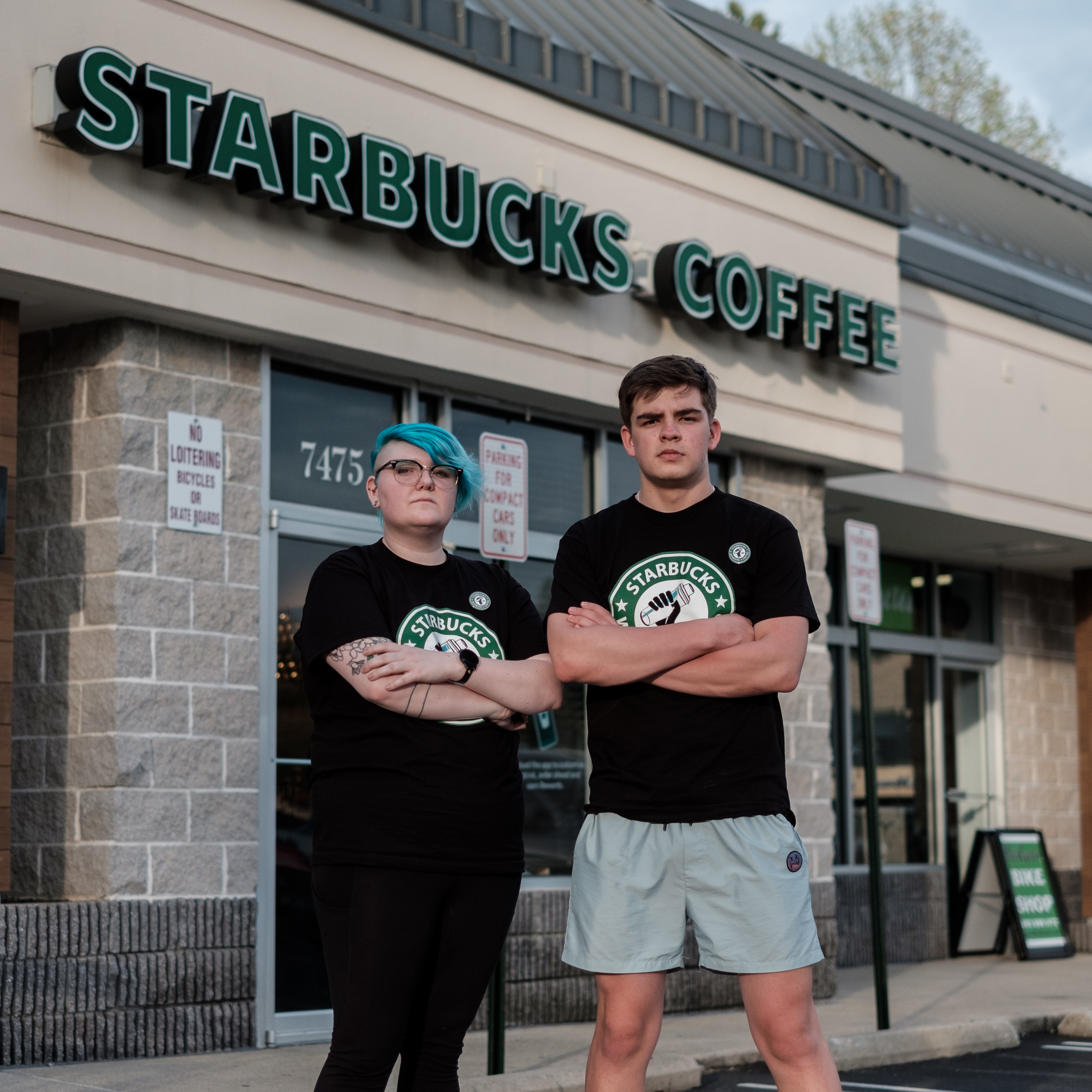Starbucks shift supervisor Gailyn Berg and barista Tim Swicord outside of their store in Springfield, Virginia. (Michael A. McCoy for NPR)