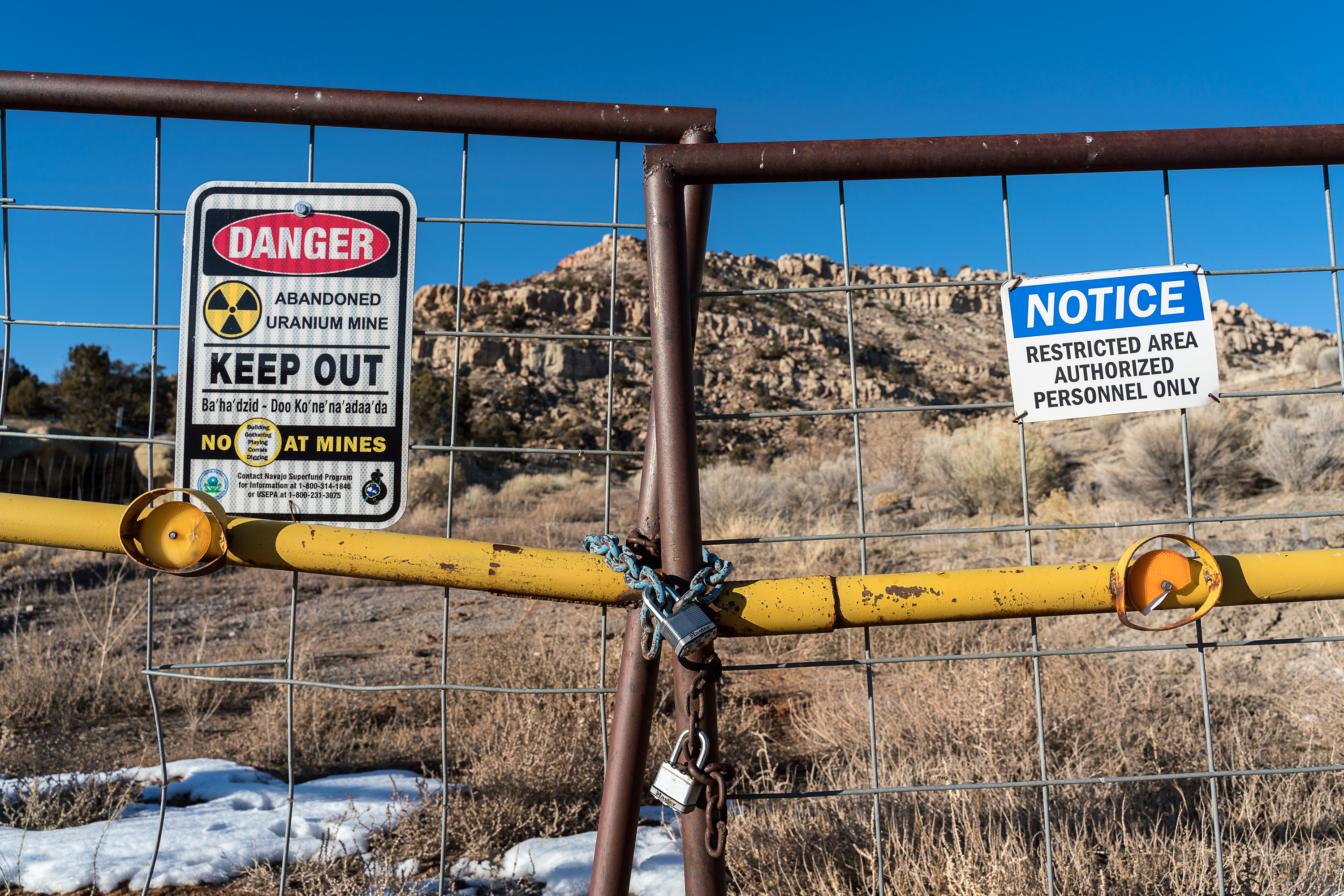 Signs warning of health risks are posted outside the gates of abandoned uranium mine in the community of Red Water Pond on Monday, Jan. 13th, 2020. (The Washington Post/Getty Images)
