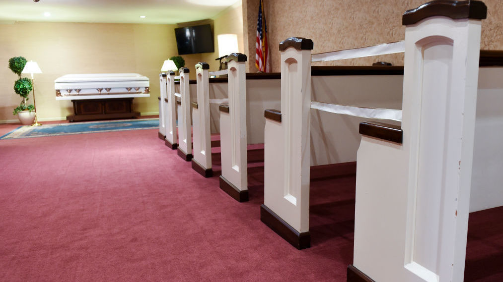Pews were marked off to encourage social distancing at a funeral home in Temple, Penn., in March of 2021, around the time the Delta variant began to take hold in the United States. (MediaNews Group via Getty Images)