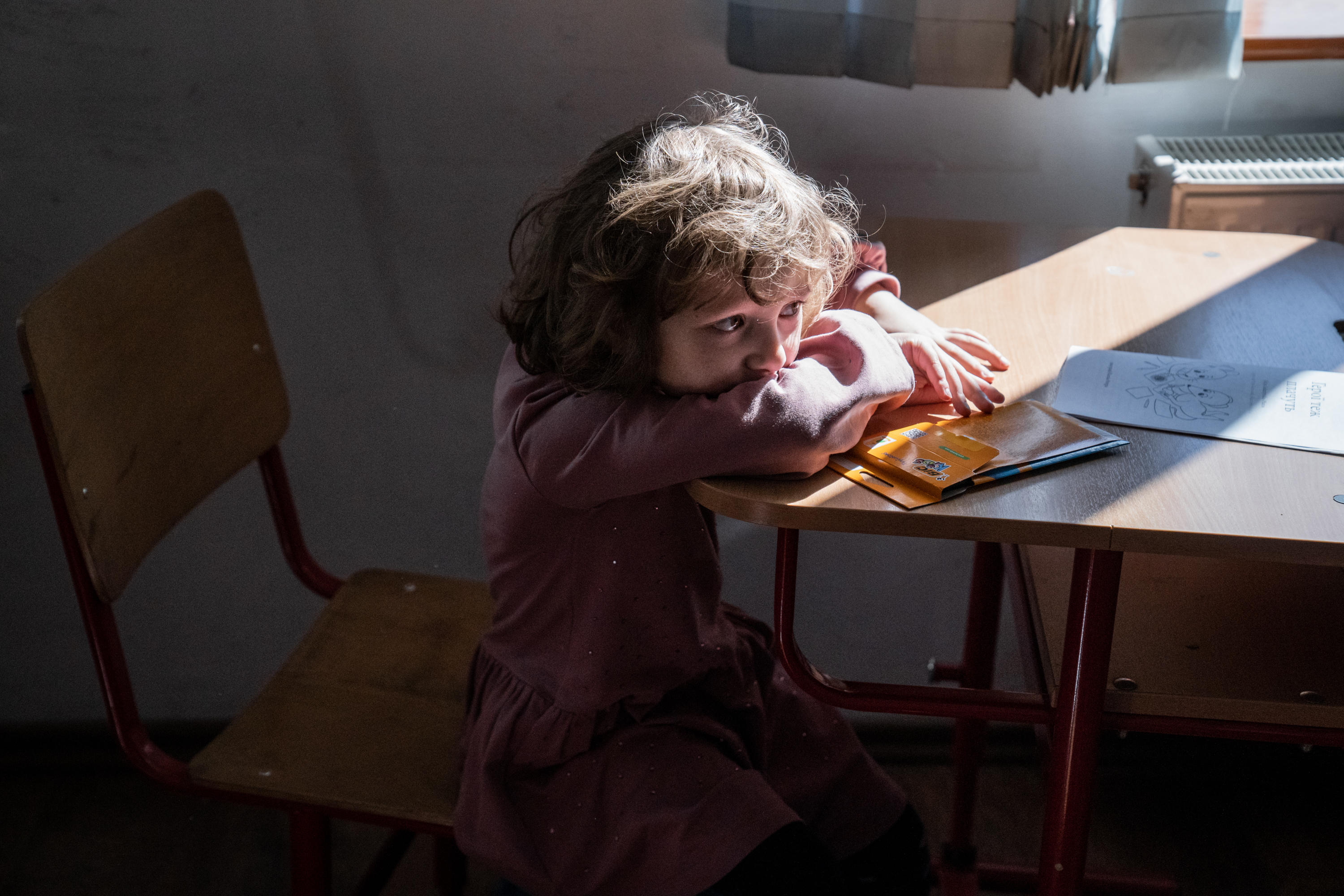 A teacher set up a school for Ukrainian refugee children in Romania 1 A Ukrainian refugee child watches an English class at the Bucharest school on April 6. The school offered the space where several classes of Ukrainian elementary school children hold their lessons.