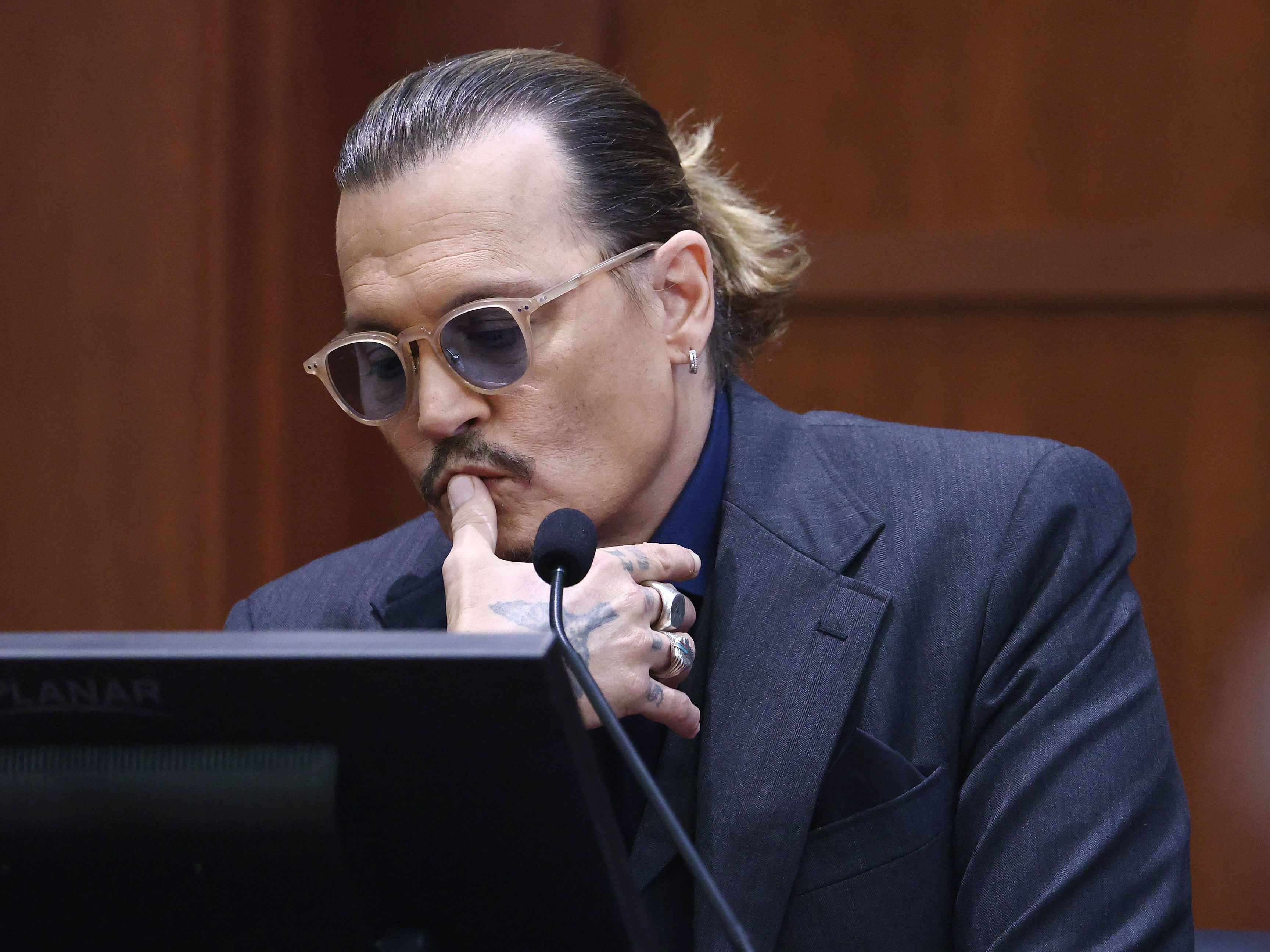 Johnny Depp's 3rd day in court focuses on his text messages about ex-wife Amber Heard - capradio.org