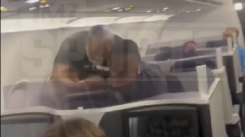 Mike Tyson repeatedly punches a passenger mid-flight, a video shows