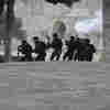 Israeli police storm Jerusalem holy site after stone throwing