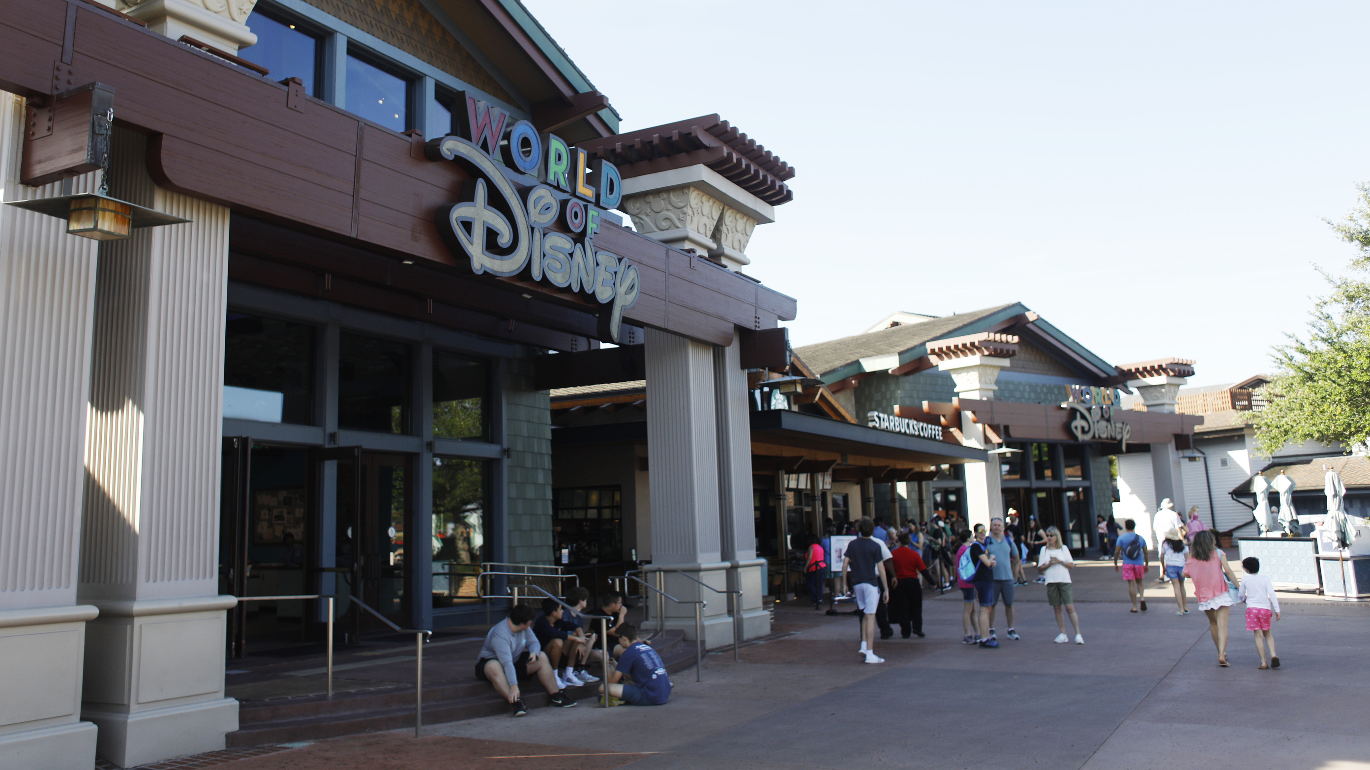 Disney operates like its own county government in Florida — but that could change, now that Gov. Ron DeSantis has signed a new bill lawmakers approved this week. Here, tourists walk through Disney Springs at Walt Disney World in Orlando, Fla., last month. (Getty Images)