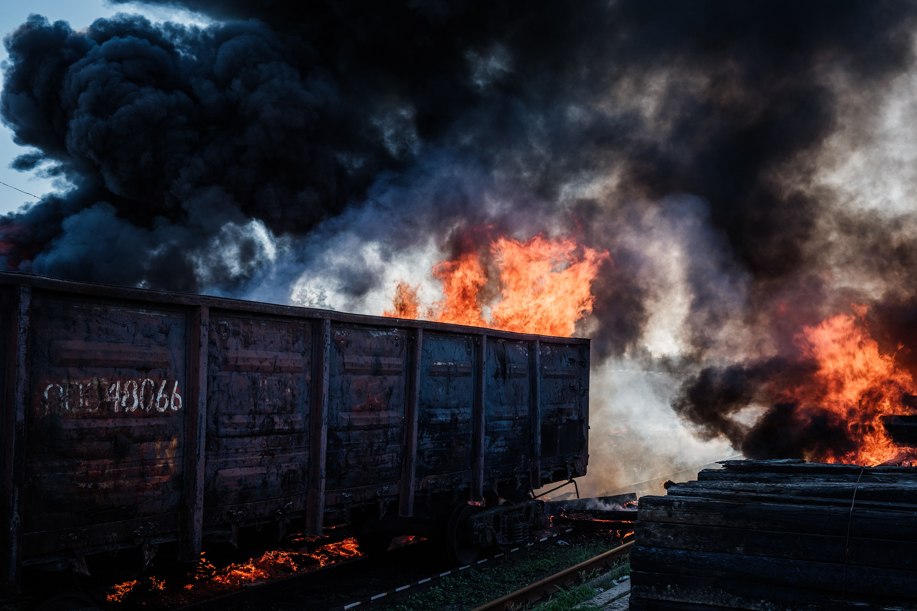 April 28: A railway wagon and sleepers burns after a shelling near the Lyman station in Lyman, eastern Ukraine, amid the Russian invasion of Ukraine.