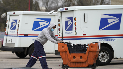 States sue the U.S. Postal Service over its decision to buy gas-powered trucks