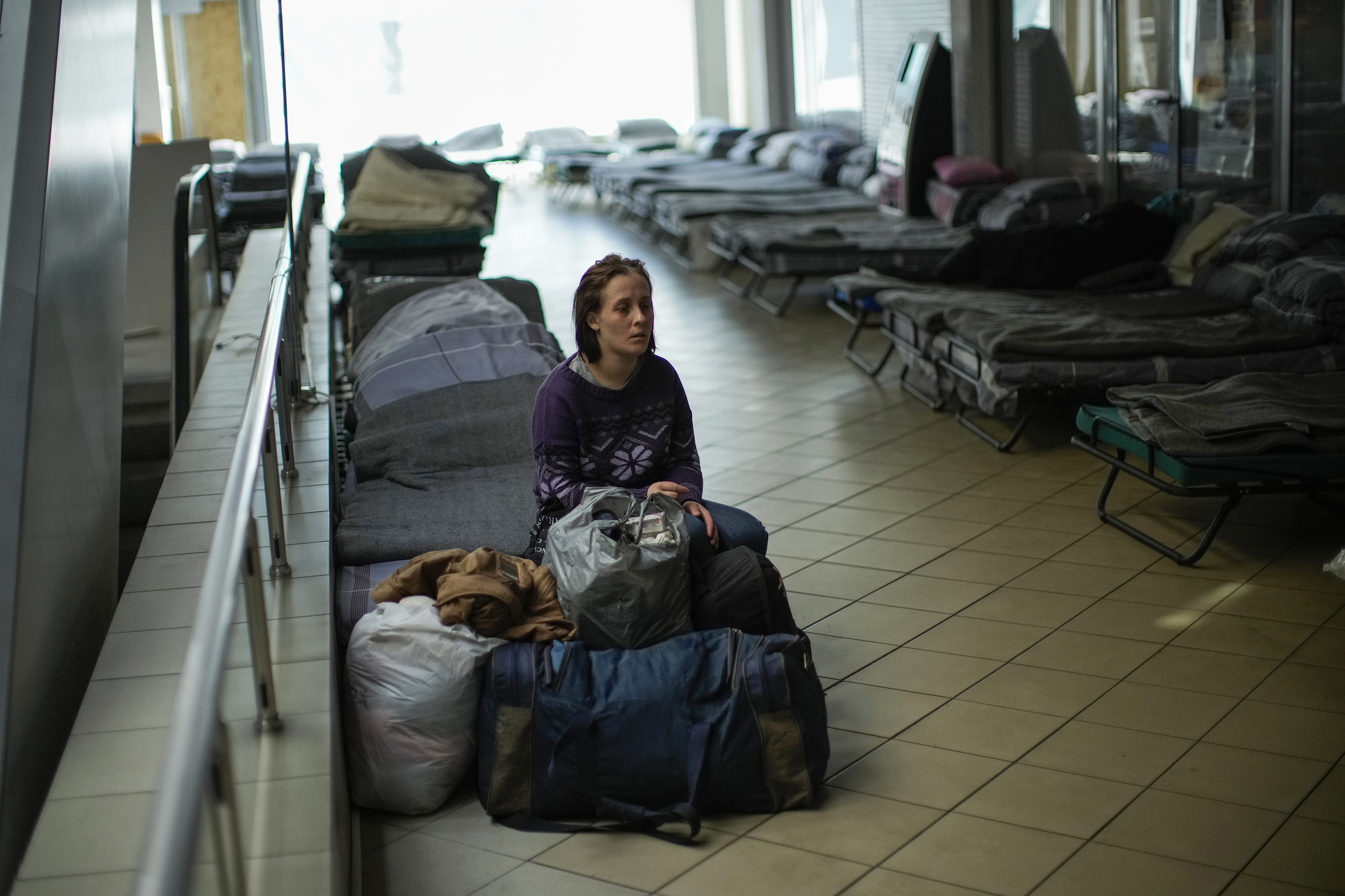 April 28: Iulia Shevchuk rests in a reception center for displaced people in Dnipro, Ukraine.