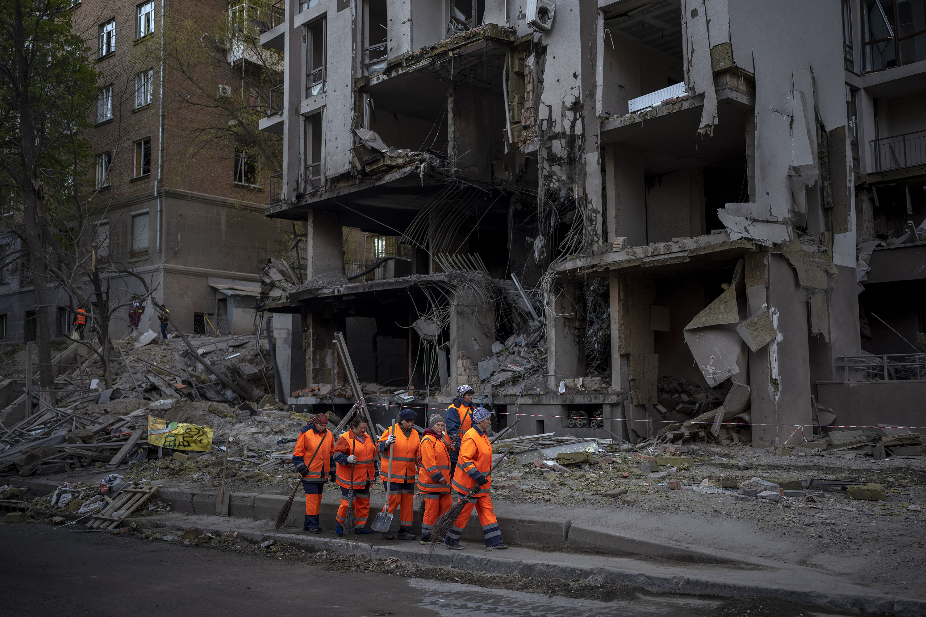 April 29: Clean-up crews prepare to work at the site of an explosion in Kyiv, Ukraine.