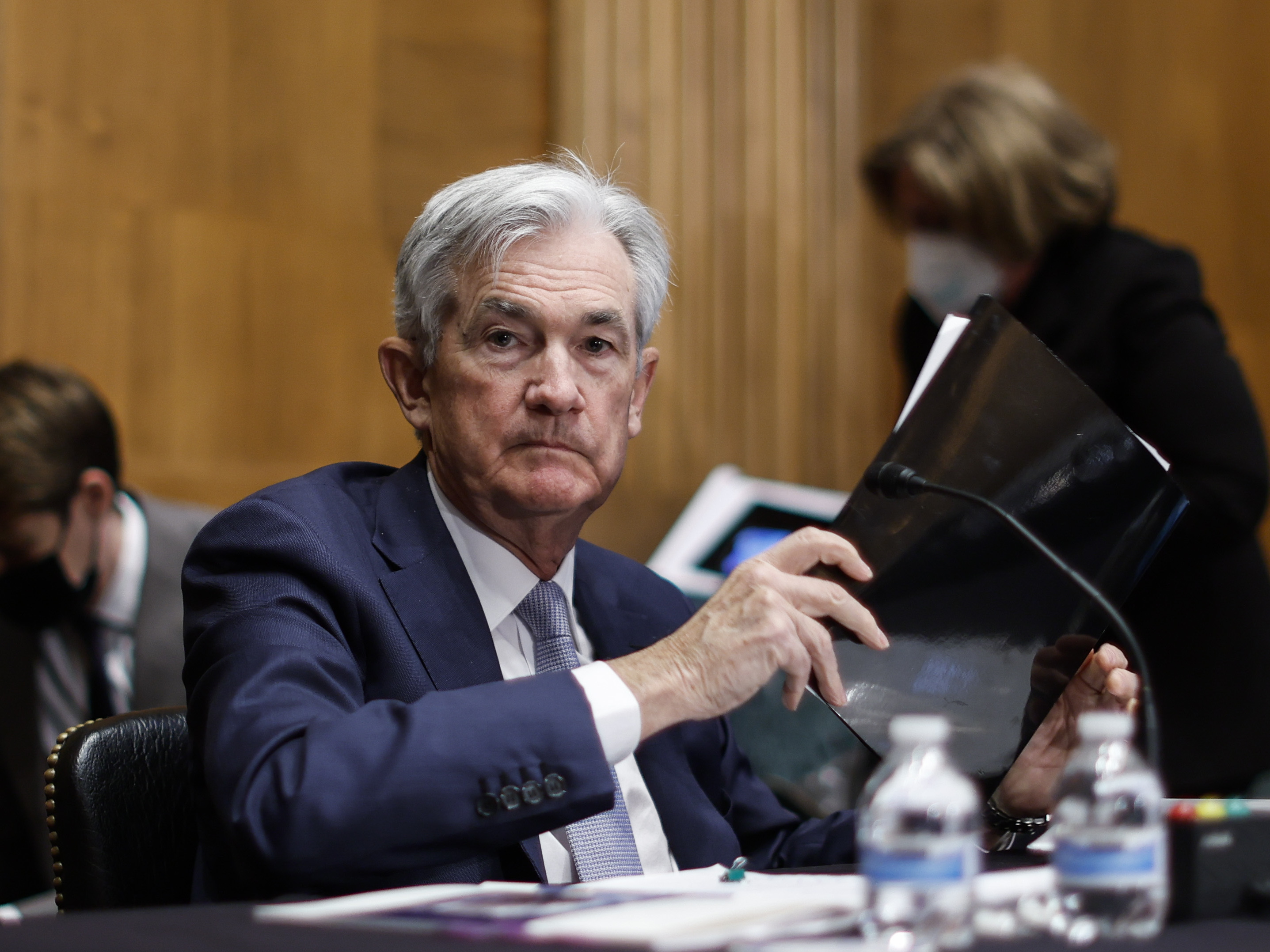 Federal Reserve Chair Jerome Powell collects his notebooks as he testifies before the Senate Banking Committee on March 3. The Fed is widely expected to raise interest rates by half a percentage point at its meeting this week. (Pool/Getty Images)
