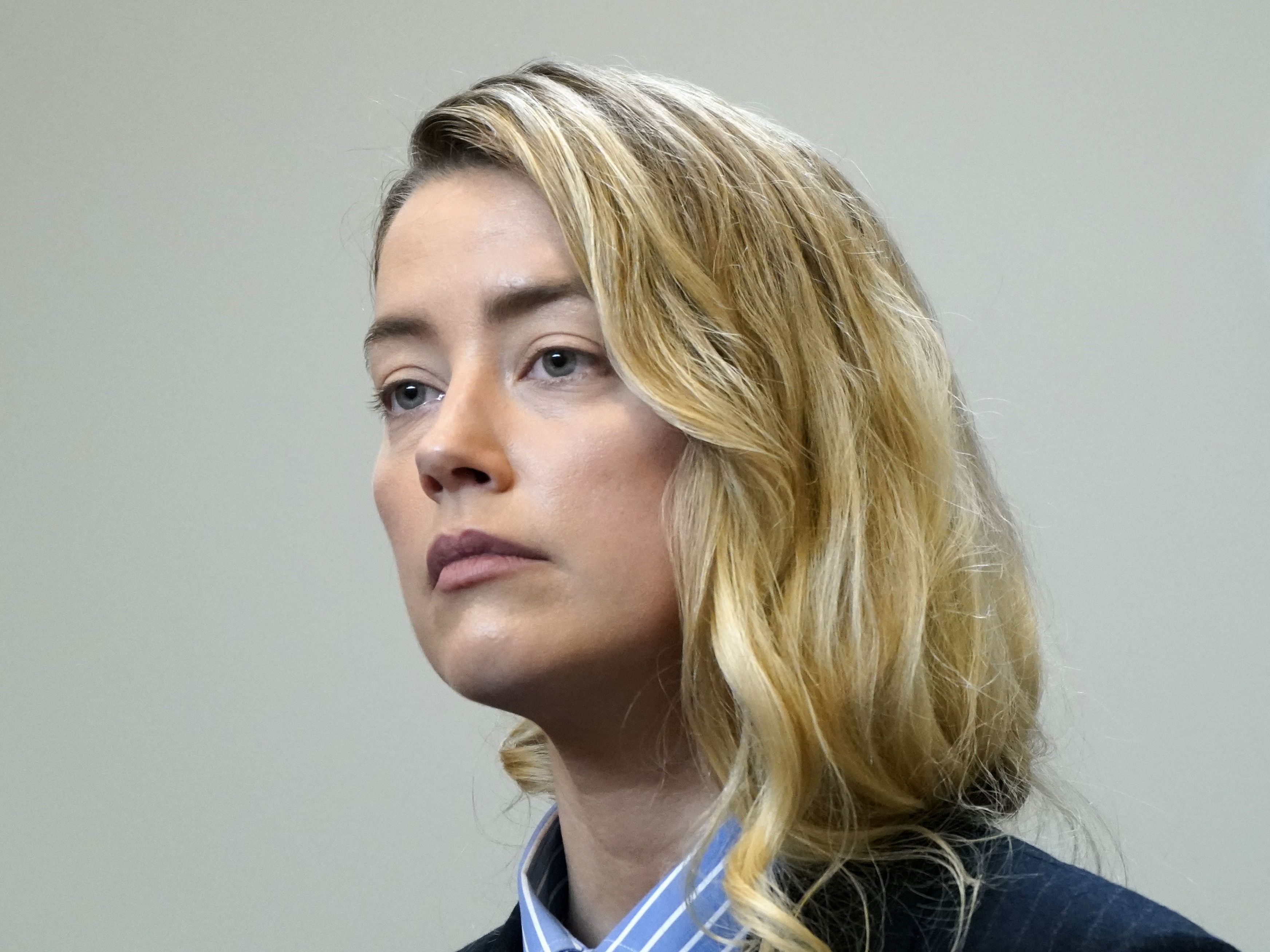 US actress Amber Heard returns to the courtroom after a lunch break at the Fairfax County Circuit Court in Virginia on Wednesday. (AFP via Getty Images)