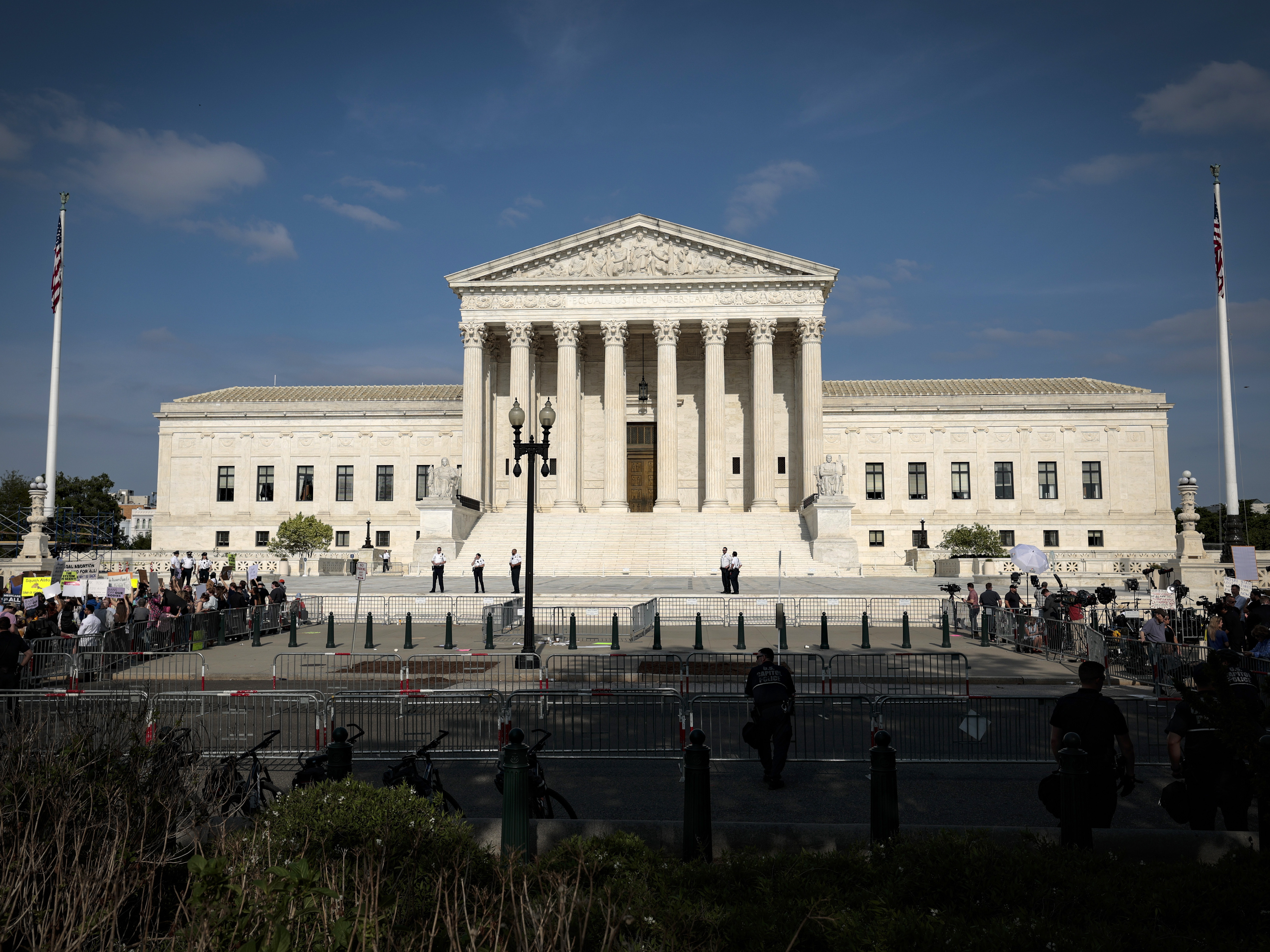 Activists protest in front of the U.S. Supreme Court on May 3, 2022, in response to a leaked draft decision to overturn <em>Roe v. Wade</em>. (Getty Images)