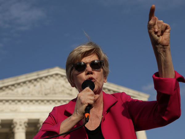 Sen. Elizabeth Warren, D-Mass., speaks during a rally in front of the Supreme Court on Tuesday in response to the leaked Supreme Court draft decision to overturn Roe v. Wade.