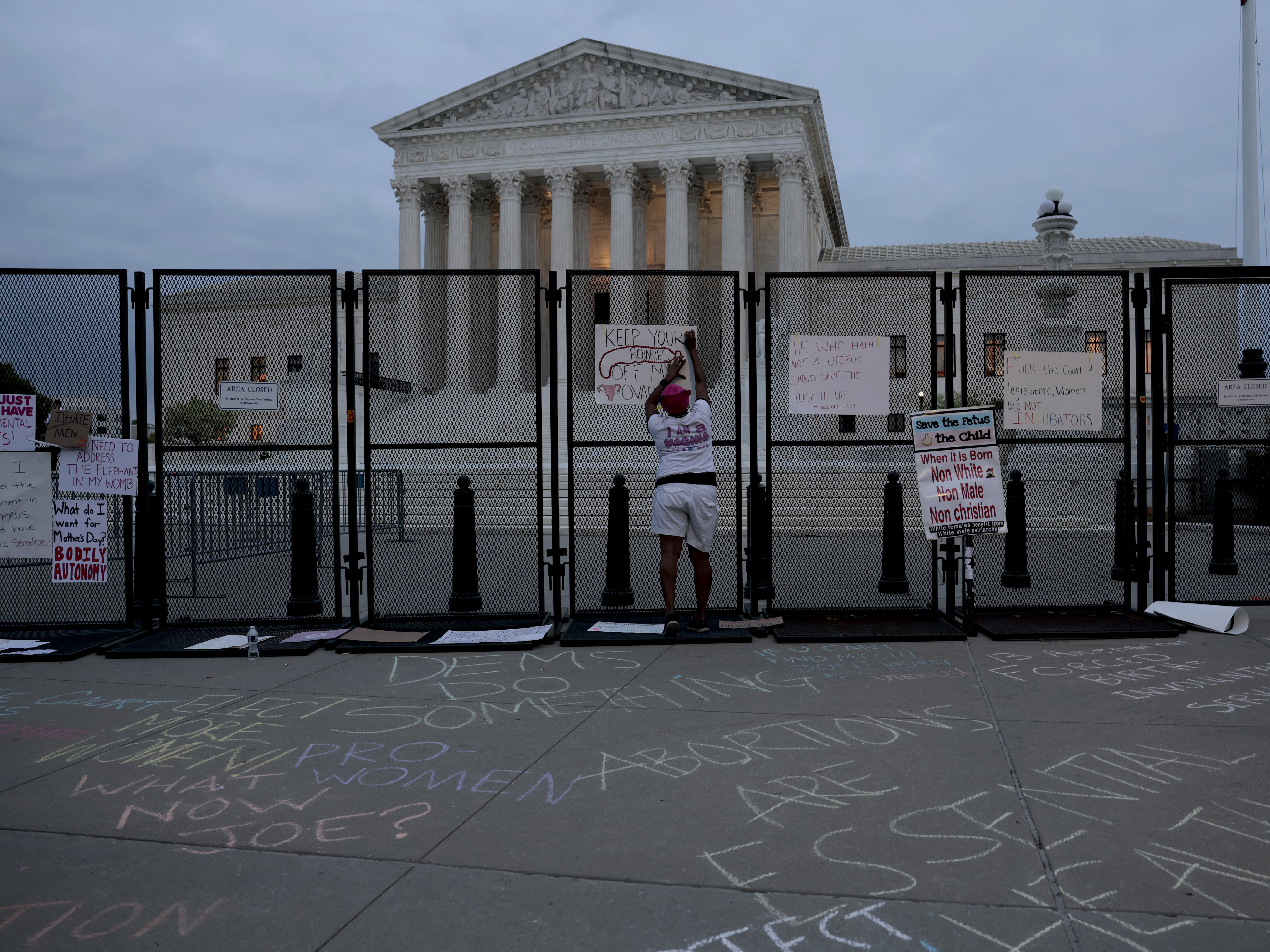 Signs on a temporary fence around the U.S. Supreme Court building on May 05, 2022 in Washington, DC. (Anna Moneymaker / Getty Images)