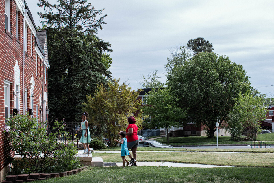 Christina Summers, 37, with her children, Elijah, Emmani and Madison in Parkville, Md.